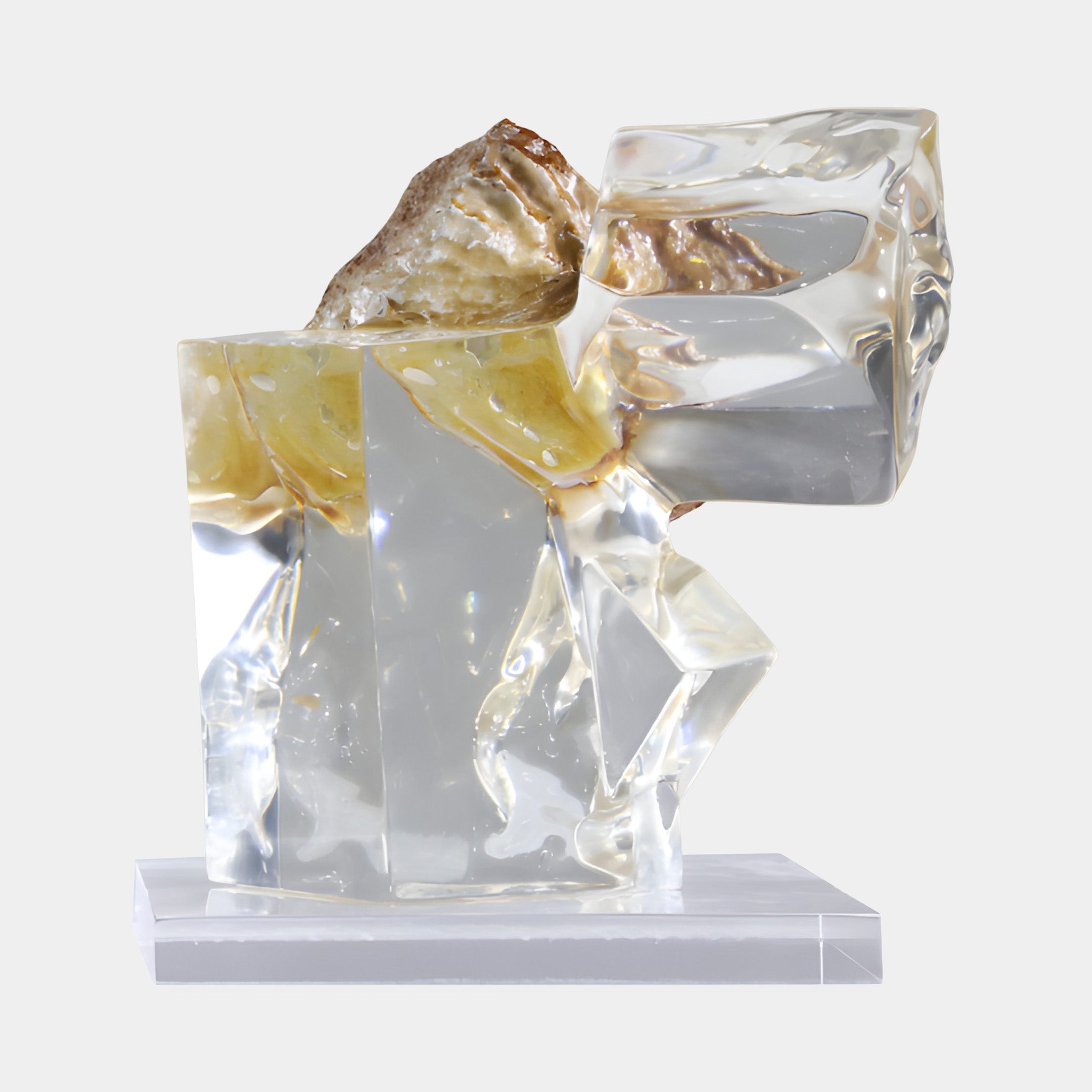 Giant Sculptures Amber Resin Crystal Blocks Sculpture with interlocking clear faceted forms and warm amber sections on a clear base against a white background.
