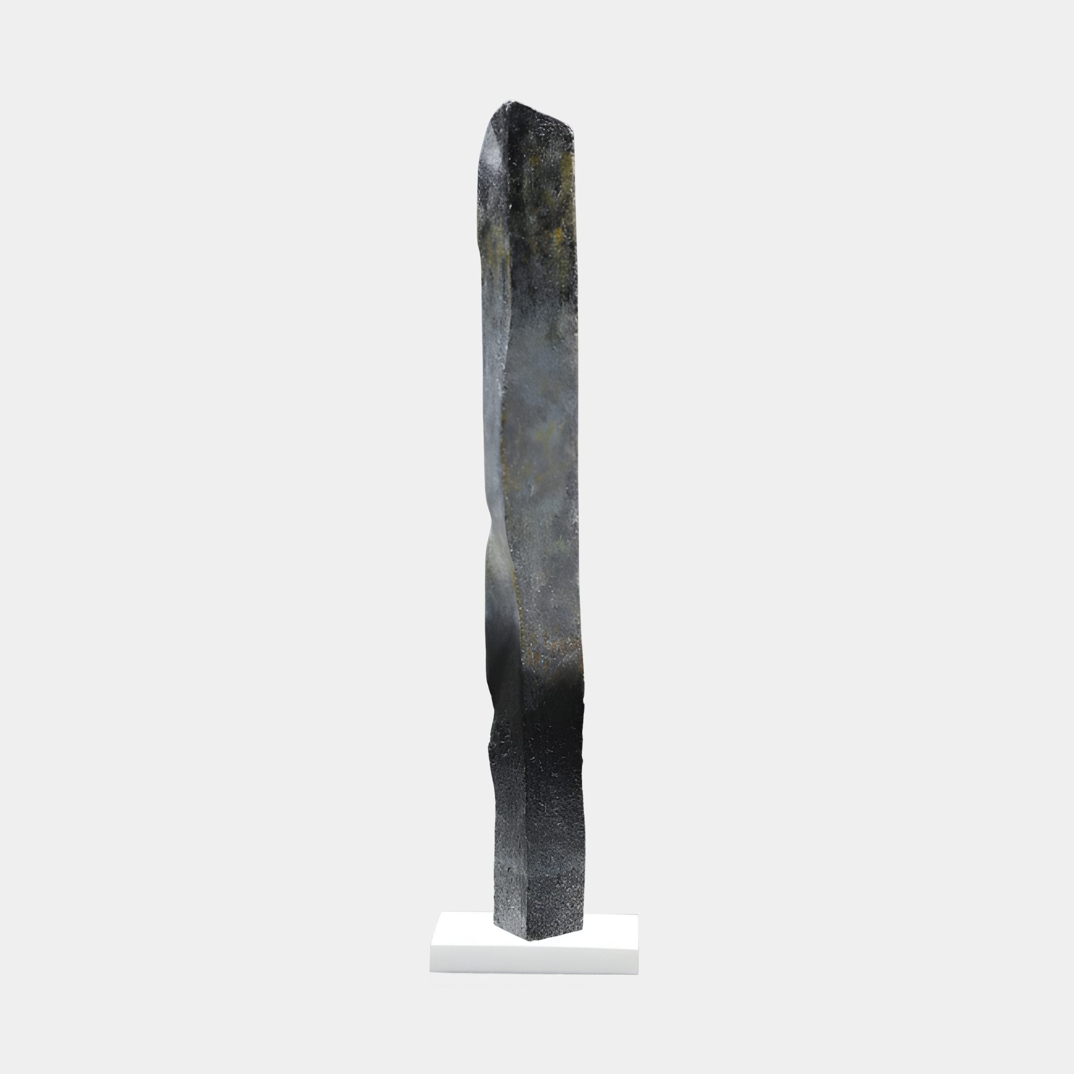 Giant Sculptures Black Abstract Column Tall Fibreglass Sculpture, 161cm, a slim weathered monolith with gold veining on a white base against a plain background.