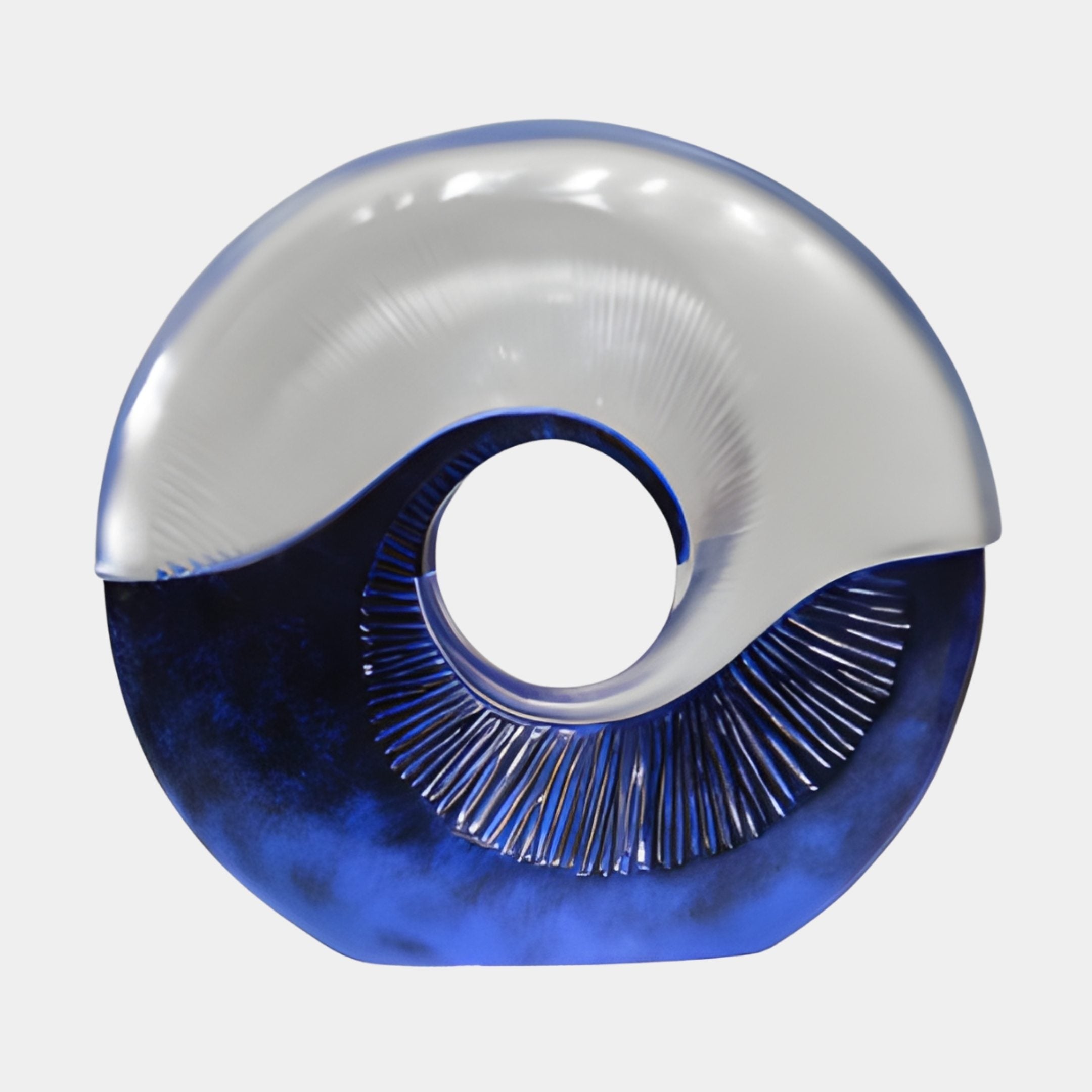 Blue & Clear Resin Yin-Yang Ring Sculpture by Giant Sculptures, featuring a frosted clear upper curve and cobalt blue lower half with radiating lines, on a plain background.