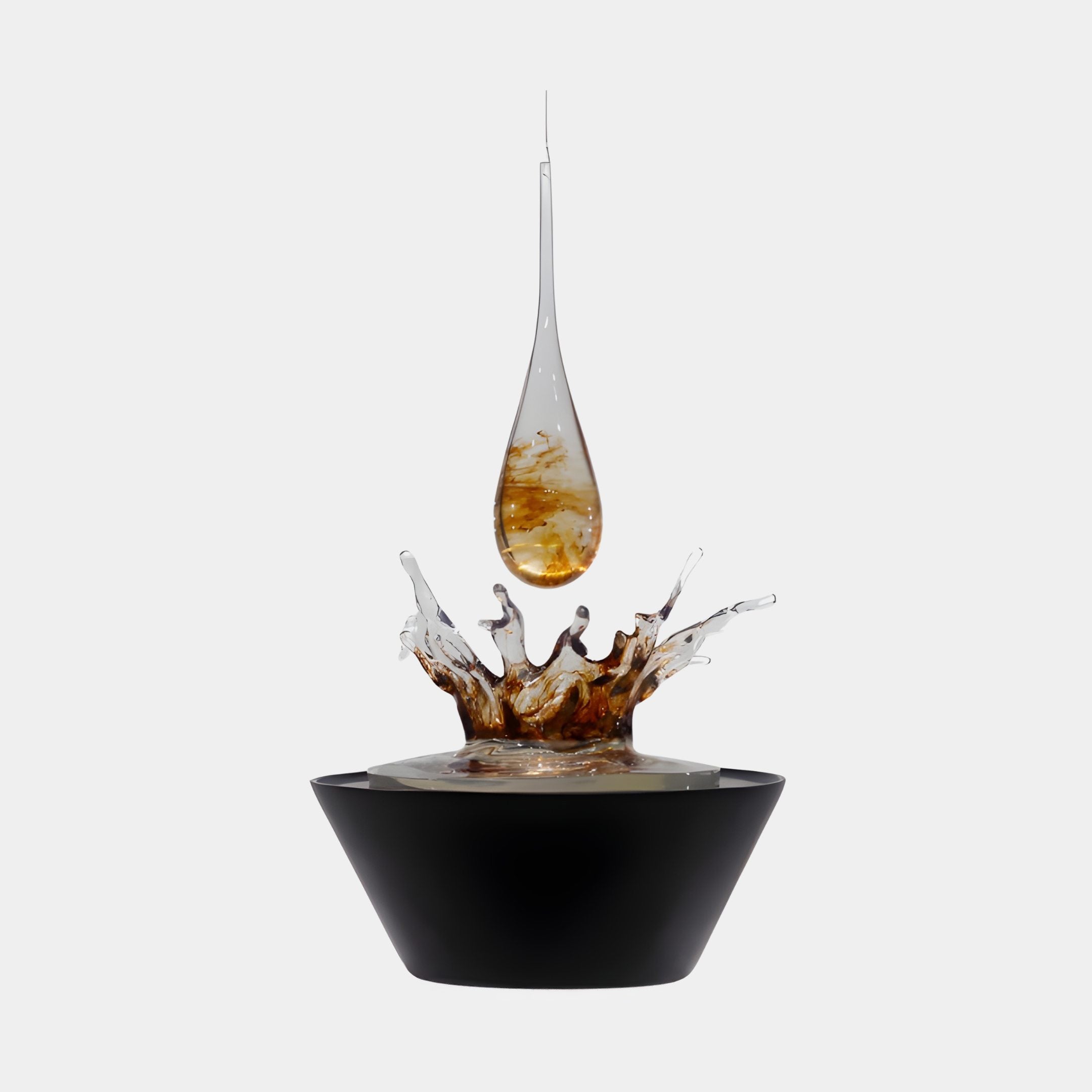 Amber Ink Infused Resin Crown Splash Sculpture by Giant Sculptures, suspended teardrop above an ink-swirled splash crown on a glossy black conical base.