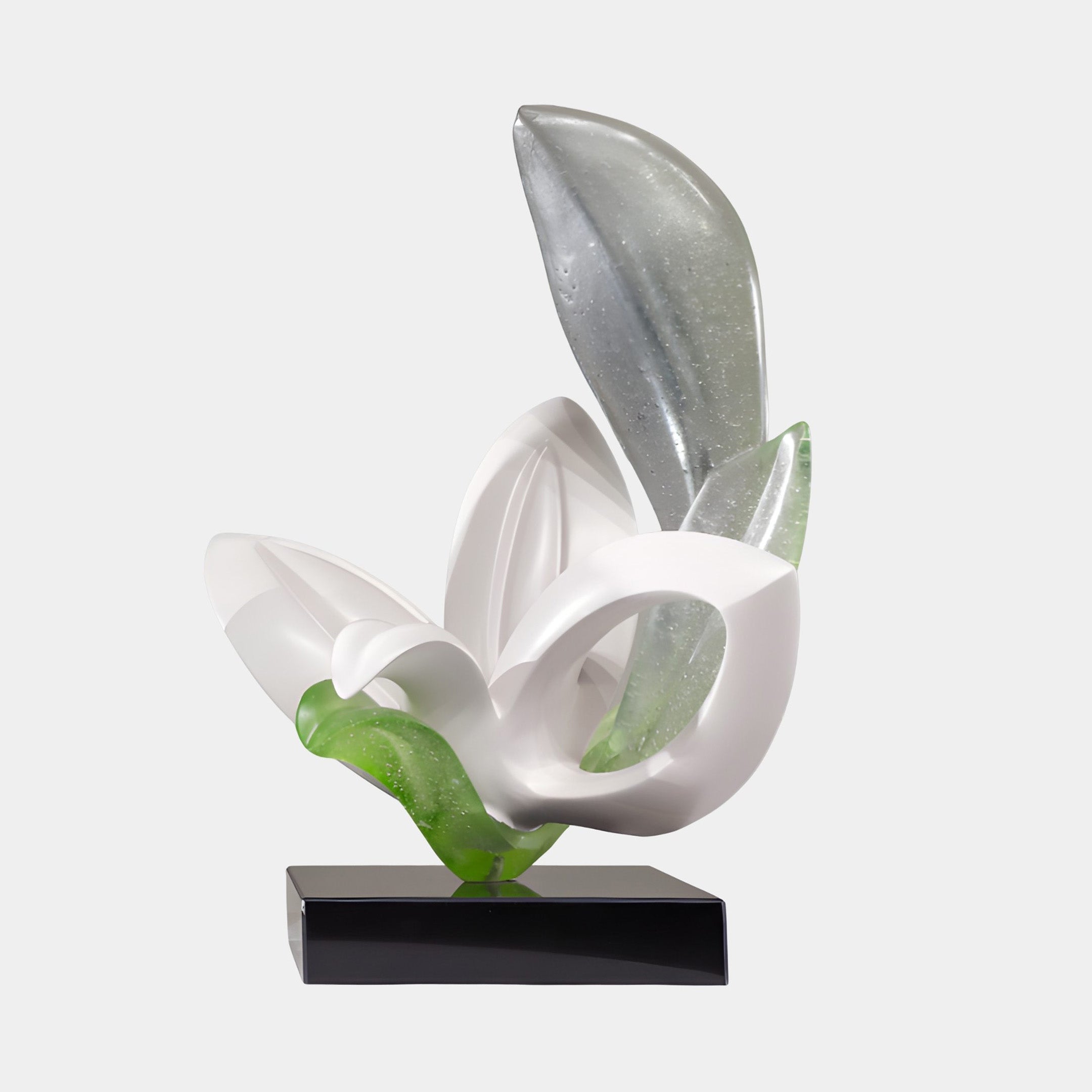Frosted Sage and White Resin Organic Orchid Sculpture by Giant Sculptures, with white petals and translucent green leaves on a black base, on a plain background.