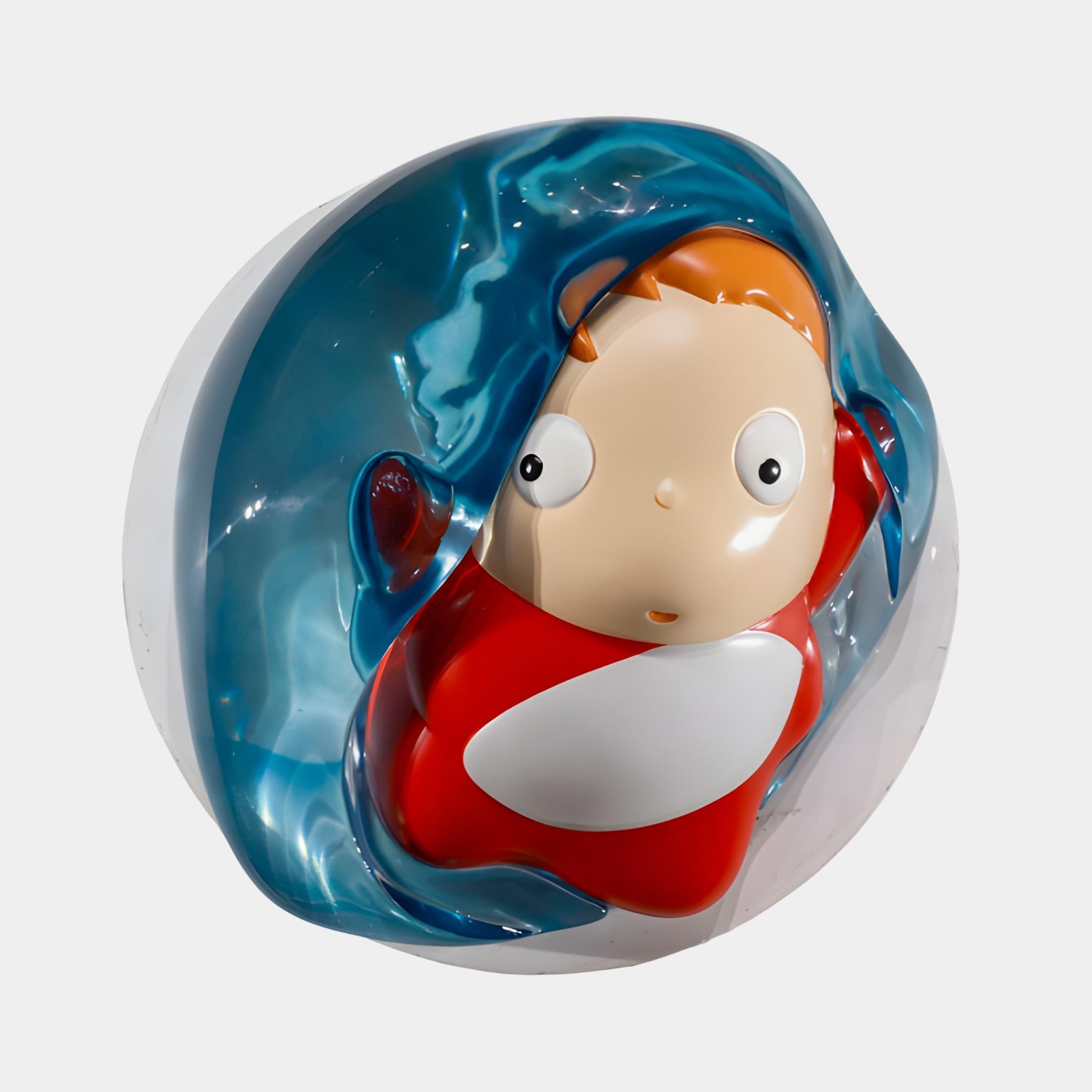 Ocean Blue Resin Splash & Character Wall Relief by Giant Sculptures, showing a child figure in a red and white outfit cradled within a glossy blue resin wave inside a clear bubble dome, on a plain light background.
