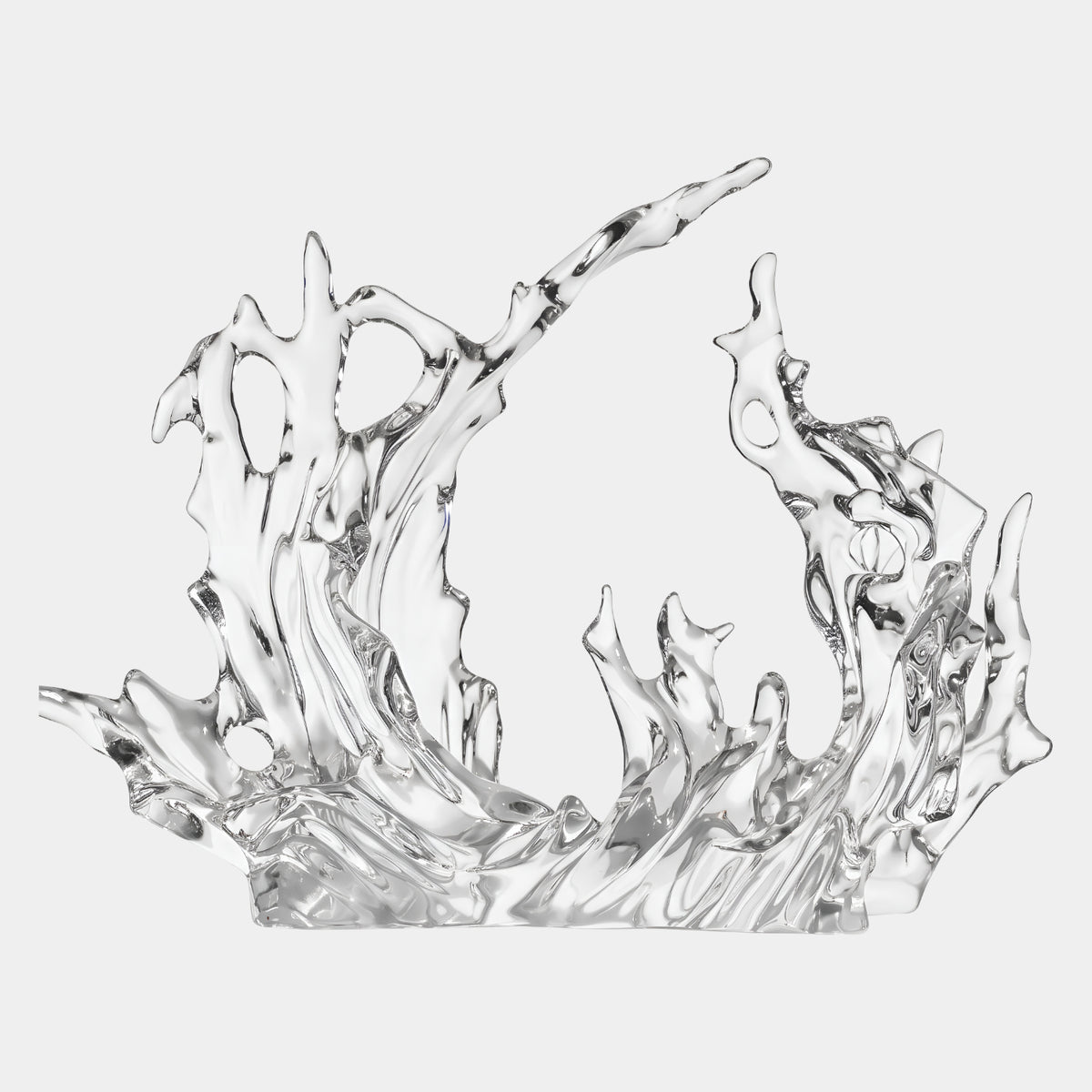 Clear Pierced Low Splash Cast Resin Sculpture (36cm) by Giant Sculptures, wave-like form with pierced openings and flame-like fingers, on a plain white background.