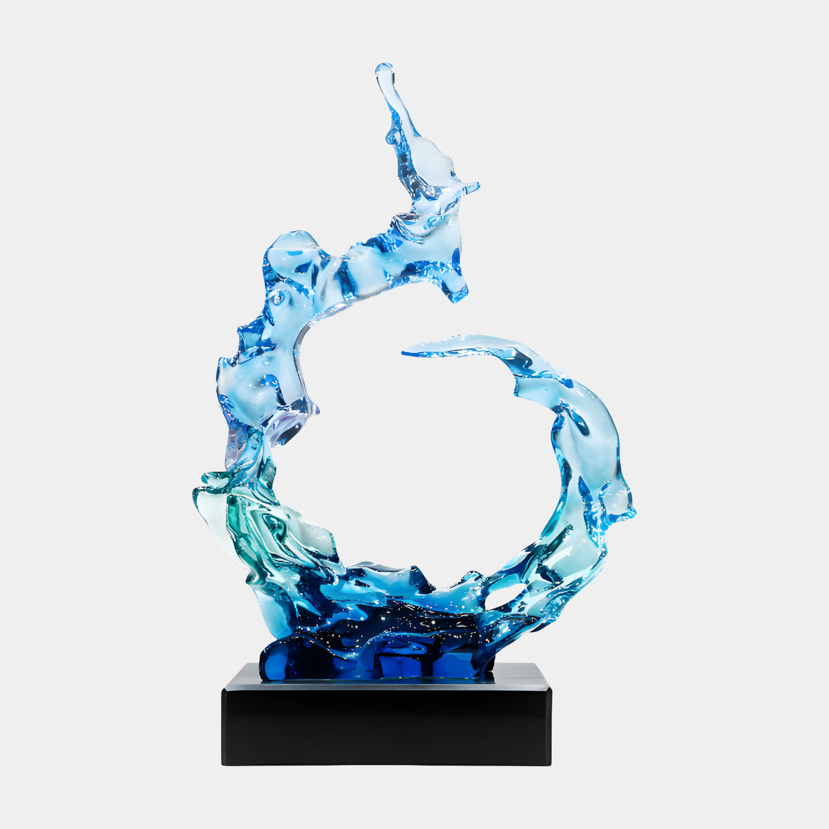 Ocean Blue Open Wave Ring Resin Sculpture, 56cm, with cobalt base rising to pale blue tips on a black rectangular stand against a plain white background.
