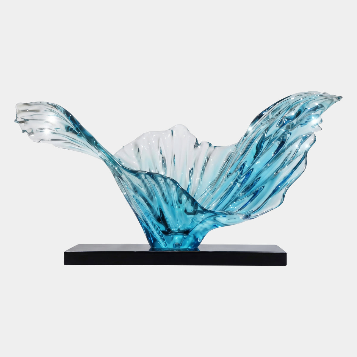 Blue Twin Winged Fan Cast Resin Sculpture, 105cm, with two asymmetrical wave-like wings fading from deep blue to clear resin, on a black marble base, plain white background.