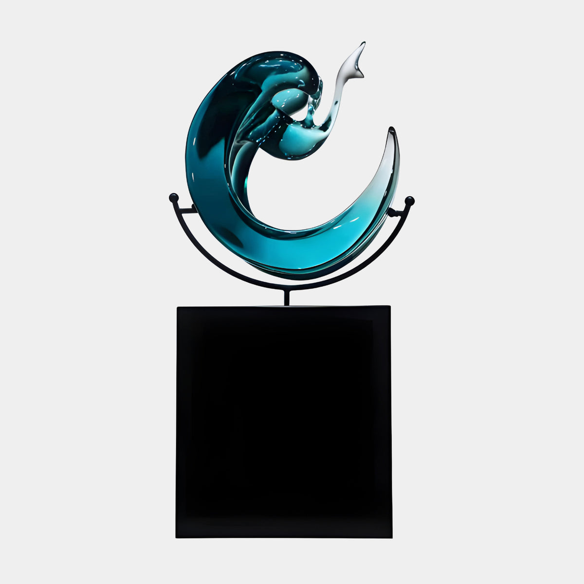 Teal Cradled Crescent Wave Resin Sculpture on Black Marble Base - 68cm, glossy teal curl fading to clear at its tip, held in a black metal cradle stand on a black square base, plain light grey background.