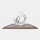 Clear Swirling Vortex Ring Resin Sculpture, 230cm, a clear wave-like vortex with branching spray on a round base, shown on a platform against a plain light background.