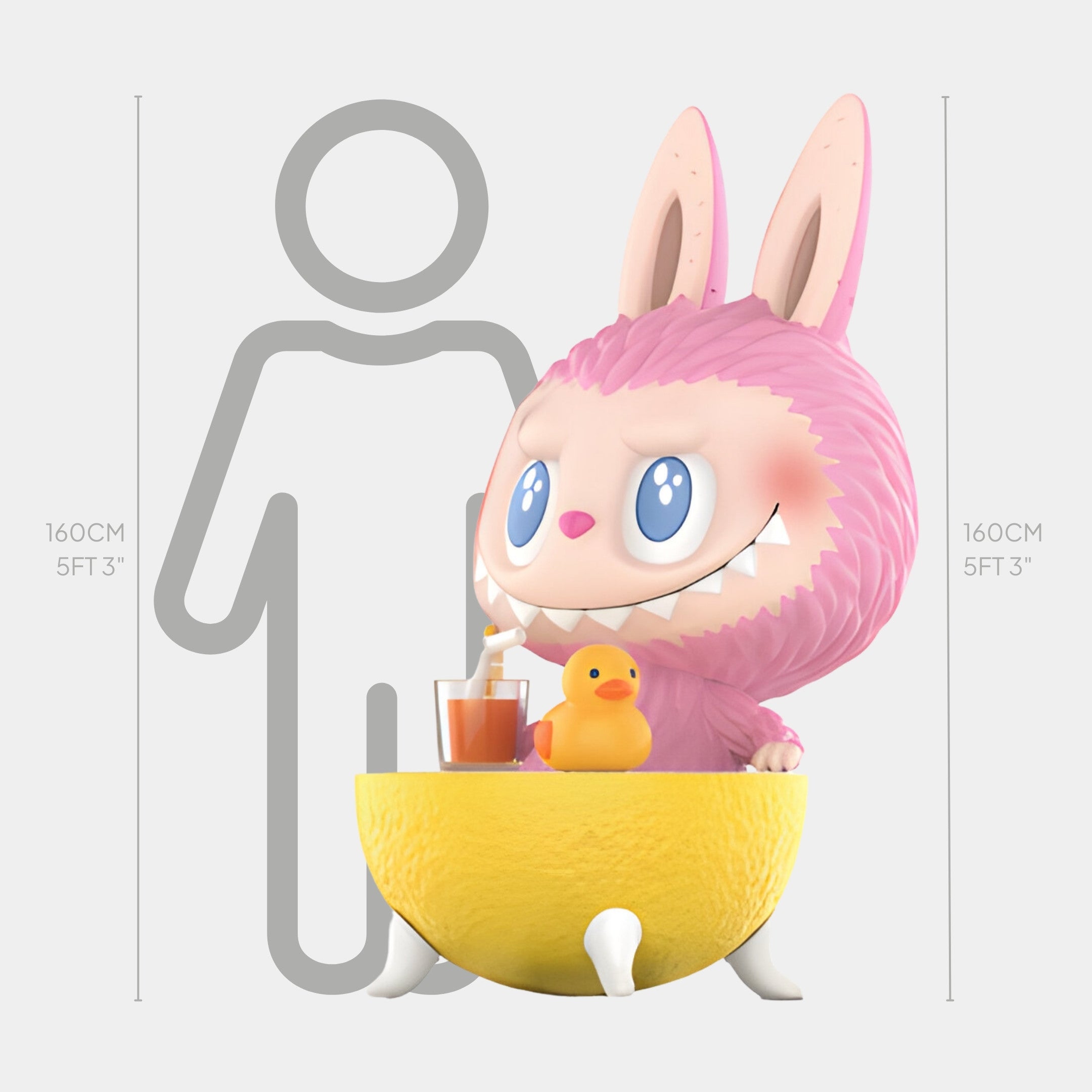 The Lemon Fruit Labubu Sculpture by Giant Sculptures is a cute, pink, bunny-like figure with big blue eyes, relaxing in a citrus half-lemon bath with a rubber duck and drink. At 160cm tall, it’s shown next to a human silhouette for scale.