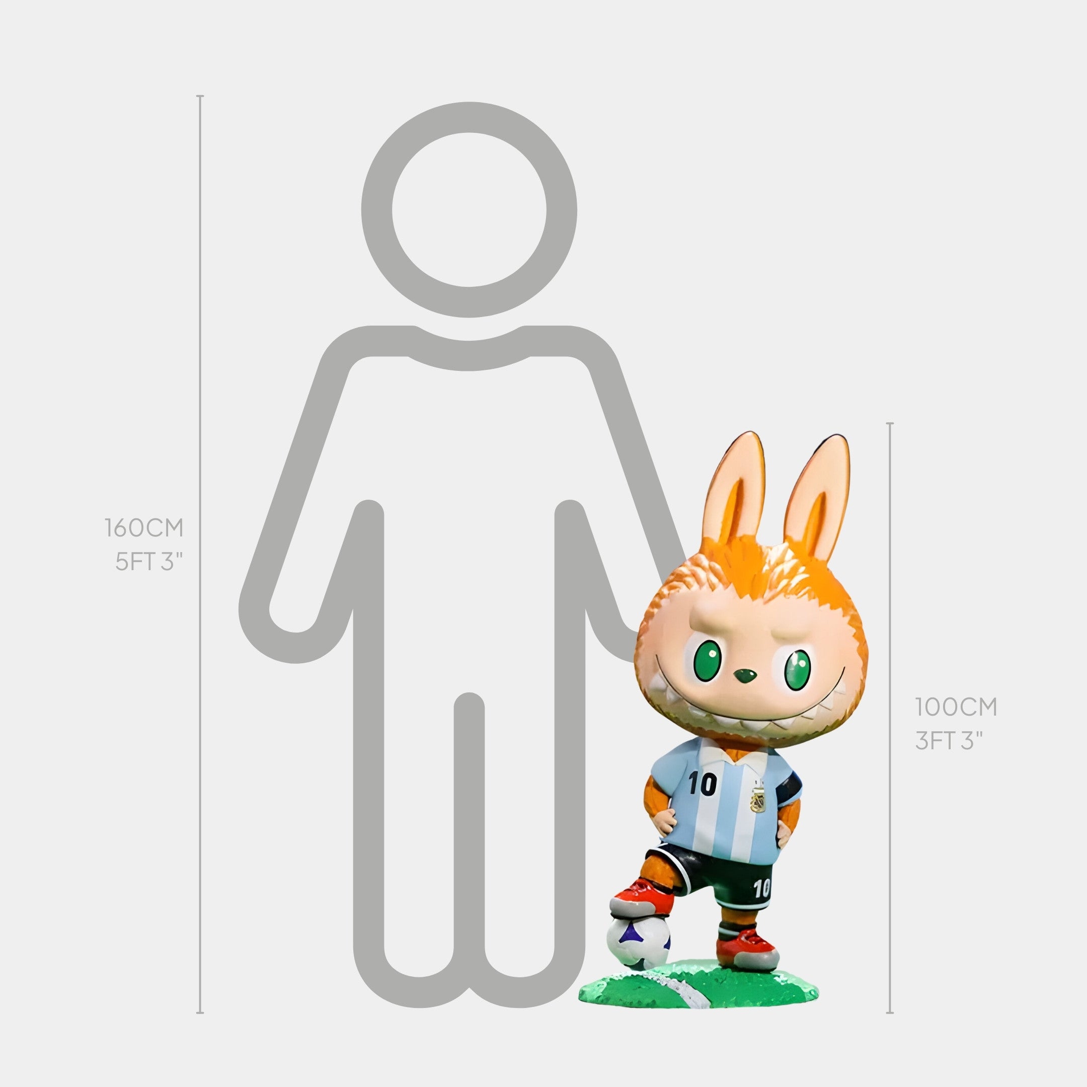 The Giant Sculptures World Cup No.10 Kick-Off Labubu Sculpture, inspired by Lionel Messi and clad in an Argentina soccer uniform, is a 100cm orange bunny posed with a soccer ball beside a 160cm gray human outline.