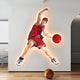 The Enlustra I Game On UV Wood LED Wall Art by Giant Sculptures features an animated basketball player in a red jersey (number 10) mid-air with a basketball, illuminated by LEDs. It enhances spaces with light wooden flooring and a lone on-ground basketball, infusing energy into the décor.