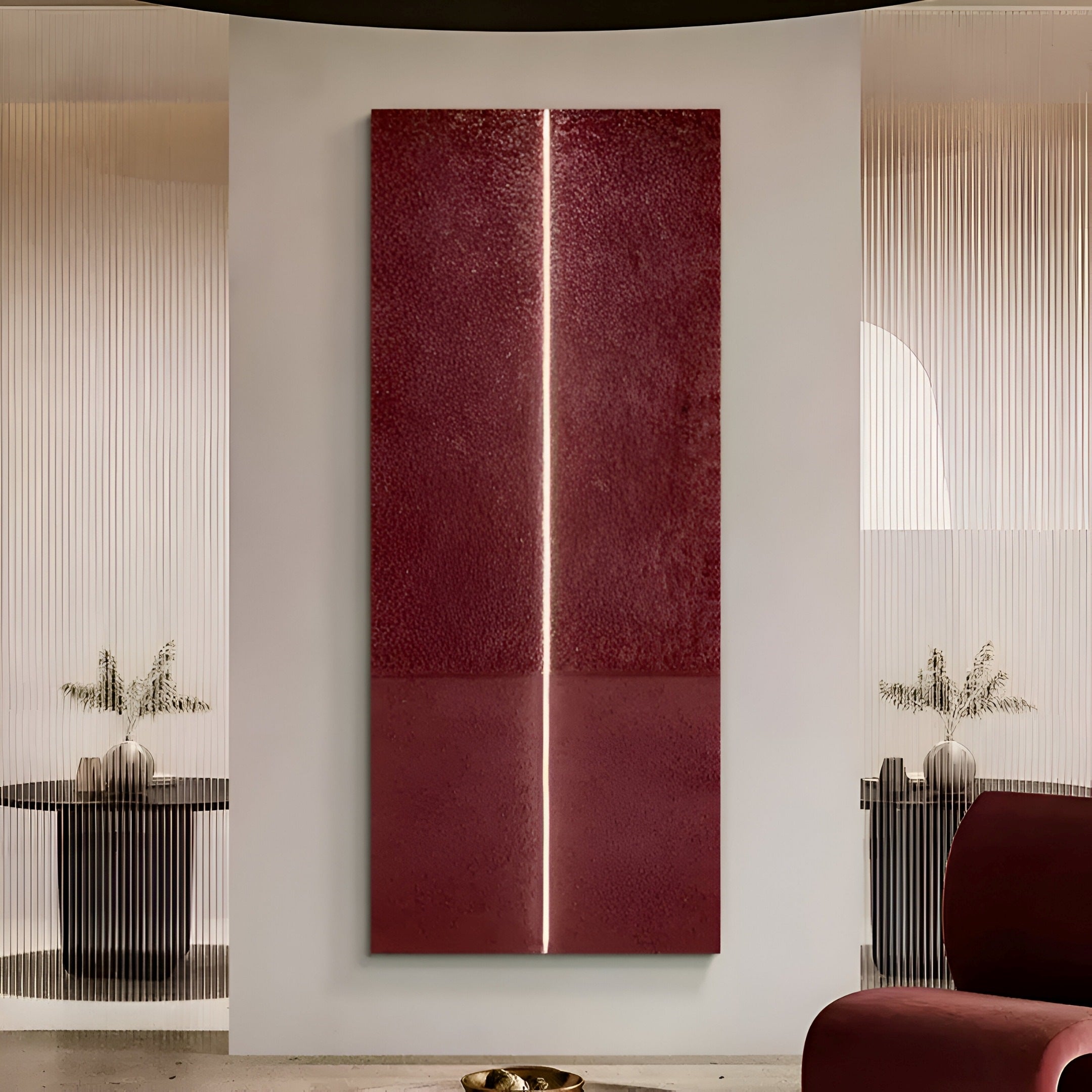 The minimalist interior showcases the Eternia Crimson Textured Oil Painting LED Wall Art by Giant Sculptures. The large hand-painted panel has a central vertical light strip, surrounded by neutral tones, soft lighting, a round table with plants, and sheer curtains framing it.