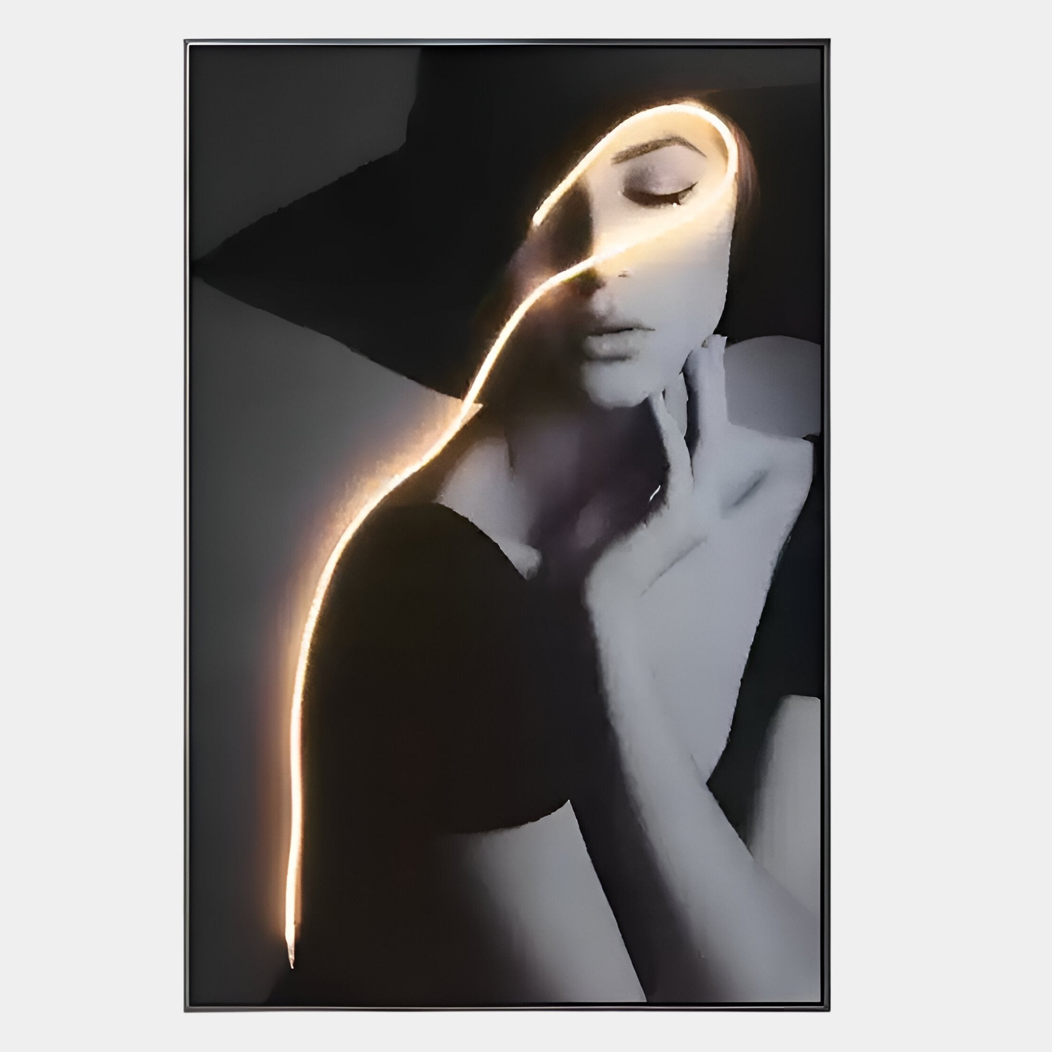 Sylva Noir Muse Canvas LED Wall Art by Giant Sculptures features a black & white portrait of a woman in a hat, her hand on her chin, with a glowing golden LED line curving over her face—ideal for contemporary interiors.