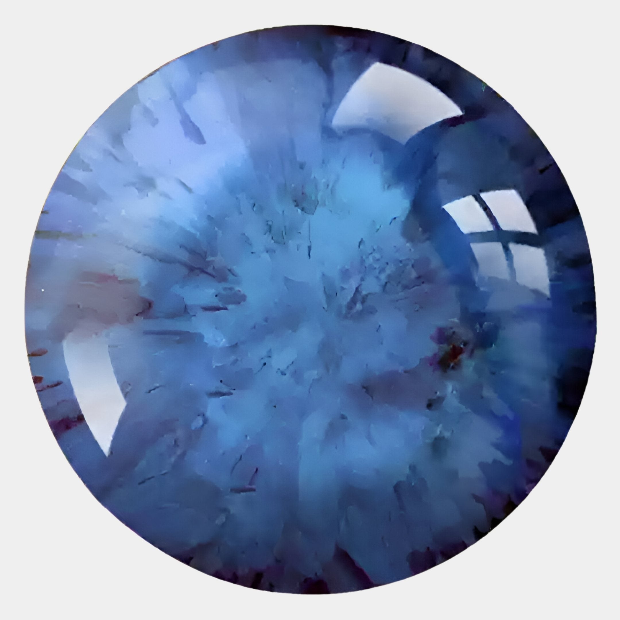 Close-up of a round, polished Genesis Ocean 3D Resin Crystal Porcelain LED Wall Art by Giant Sculptures, featuring cloudy, radiating patterns and glossy surface reflections.