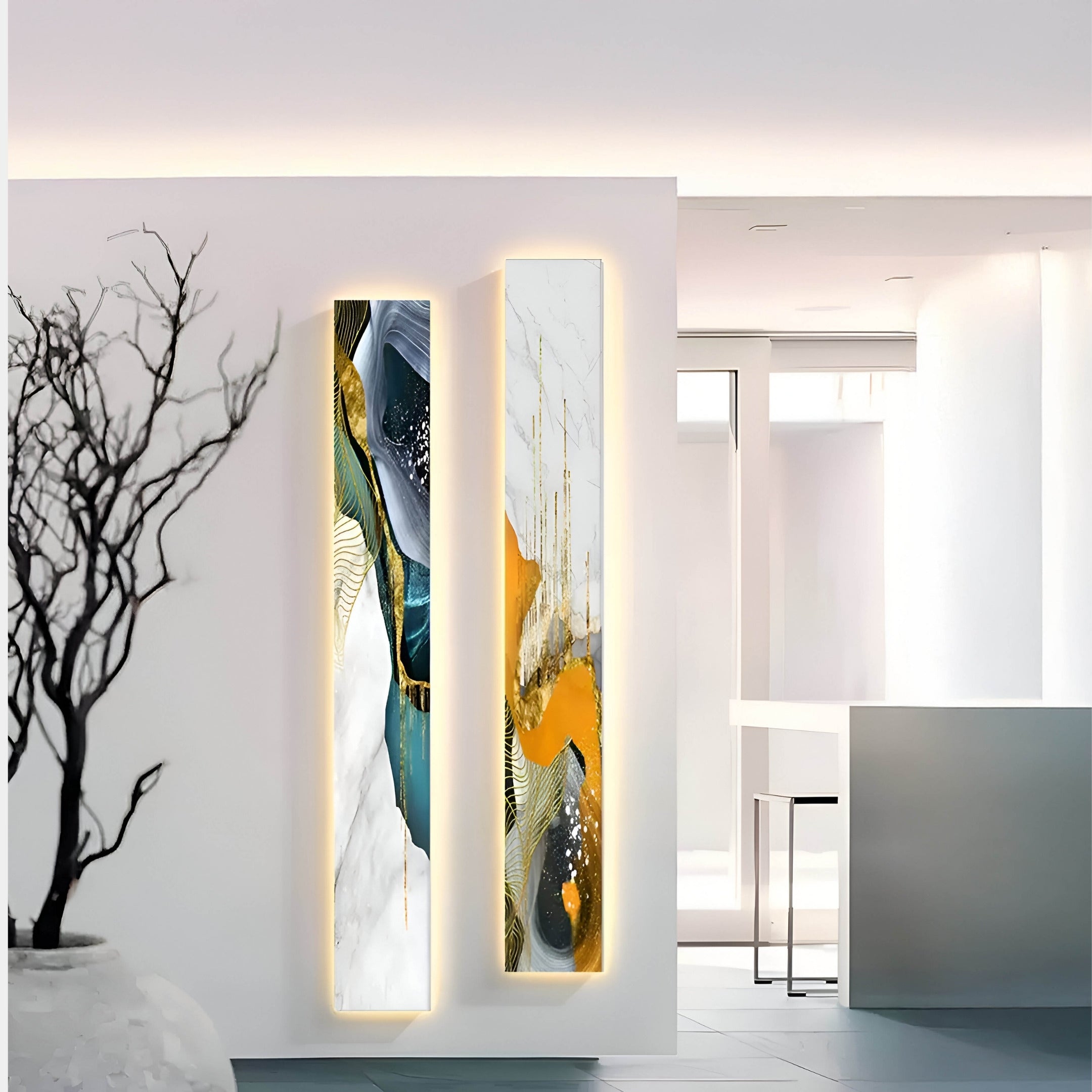 In a minimalist interior, the Floren Oceanic Drift Canvas LED Wall Art by Giant Sculptures adorns the wall with tranquil coastal abstract shapes in blue, gold, and white. A white vase with bare branches sits to the left, enhancing the rooms clean lines and modern design.