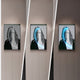 Elysian Veiled Grace 3D LED Wall Art by Giant Sculptures features three identical portraits of a long-haired individual leaning back on a gray canvas. Each framed piece is hung vertically and accented with a blue neon line, chin to forehead, enhancing its modern design.