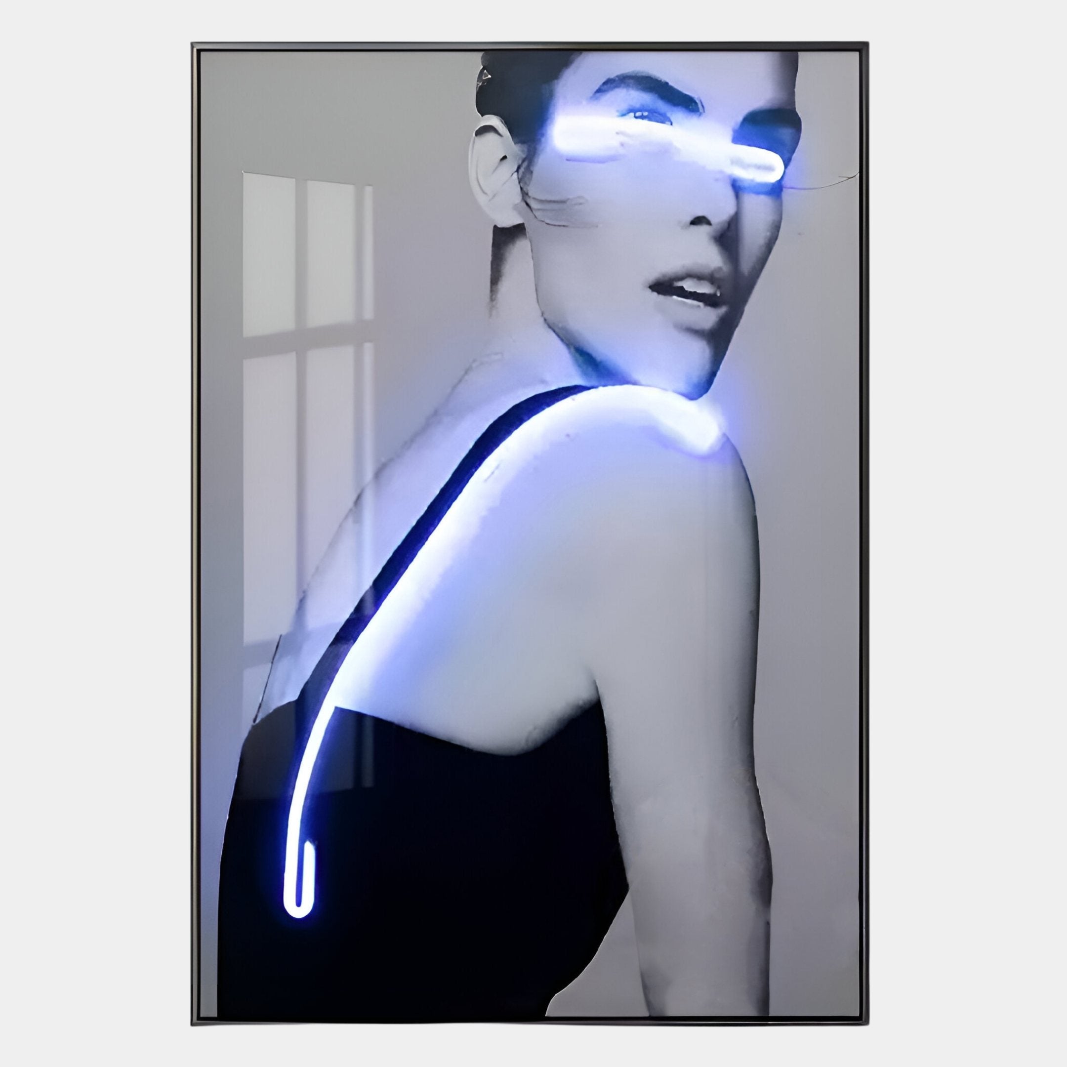 Elysian Luminescent Gaze 3D LED Wall Art by Giant Sculptures features a black and white portrait of a woman in a sleeveless top, illuminated by vivid blue neon lights highlighting her eyes, shoulder, and back—a contemporary masterpiece.