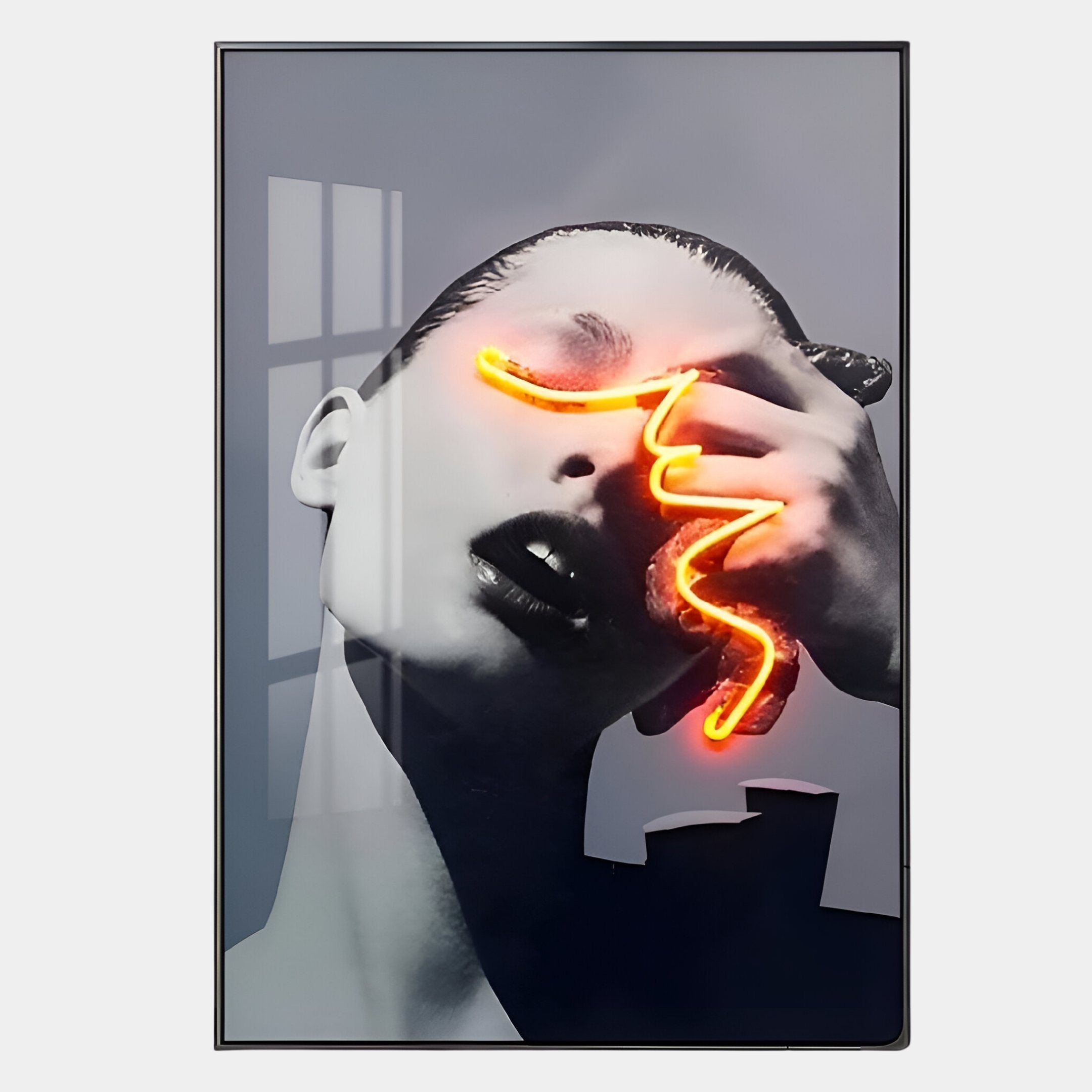 A black-and-white photo of a person partly covering their face is enhanced by Giant Sculptures Elysian Vibrant Contour 3D LED Wall Art—a vivid orange neon squiggle—obscuring their eyes and reflecting window light for an immersive effect.