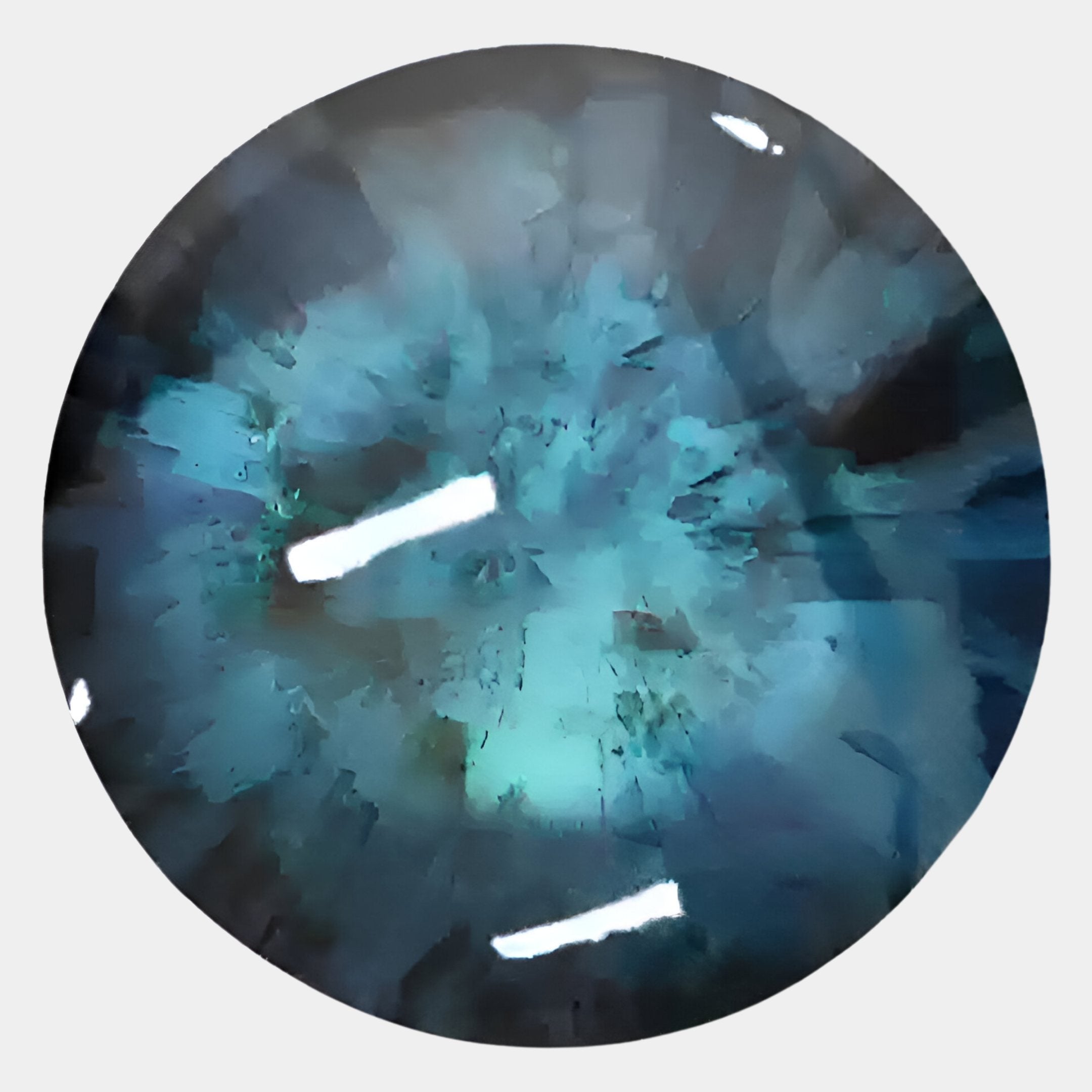 A close-up of the Vitreon 3D Blue Crystal Porcelain Wall Art by Giant Sculptures shows its round, blue-green surface with intricate patterns and light reflections, evoking a striking, contemporary artistic appeal.