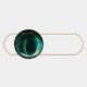 The Giant Sculptures Vitreon Emerald Flat Crystal Porcelain Wall Art features a round, emerald green glass orb centered in an oval gold frame, creating a bold accent against a plain light background.