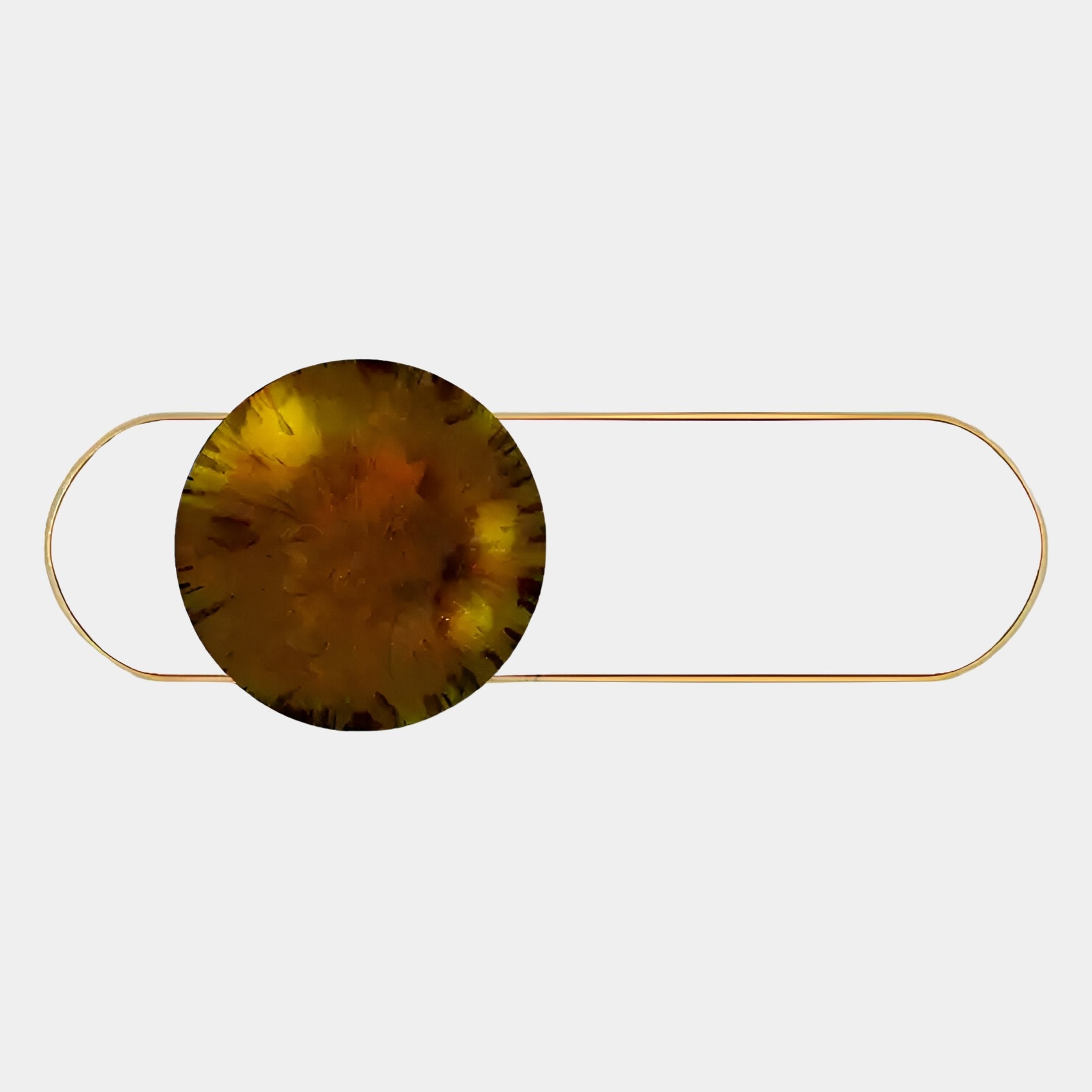The Vitreon Amber Flat Crystal Porcelain With Gold Frame Wall Art by Giant Sculptures features a large, round amber porcelain accent with dark organic patterns, set in a gold frame against a plain light gray background.