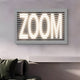 LED wall decor showcasing ZOOM in a minimalist frame, adding a contemporary touch to a living room with neutral tones and stylish furnishings.