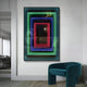 A modern room highlights Giant Sculptures Vitralis Colorwave 3D Mirror LED wall art with concentric rectangles in green, blue, and red. Below, a teal curved chair rests on a light wood floor, while a large reflective window adorns the left side.