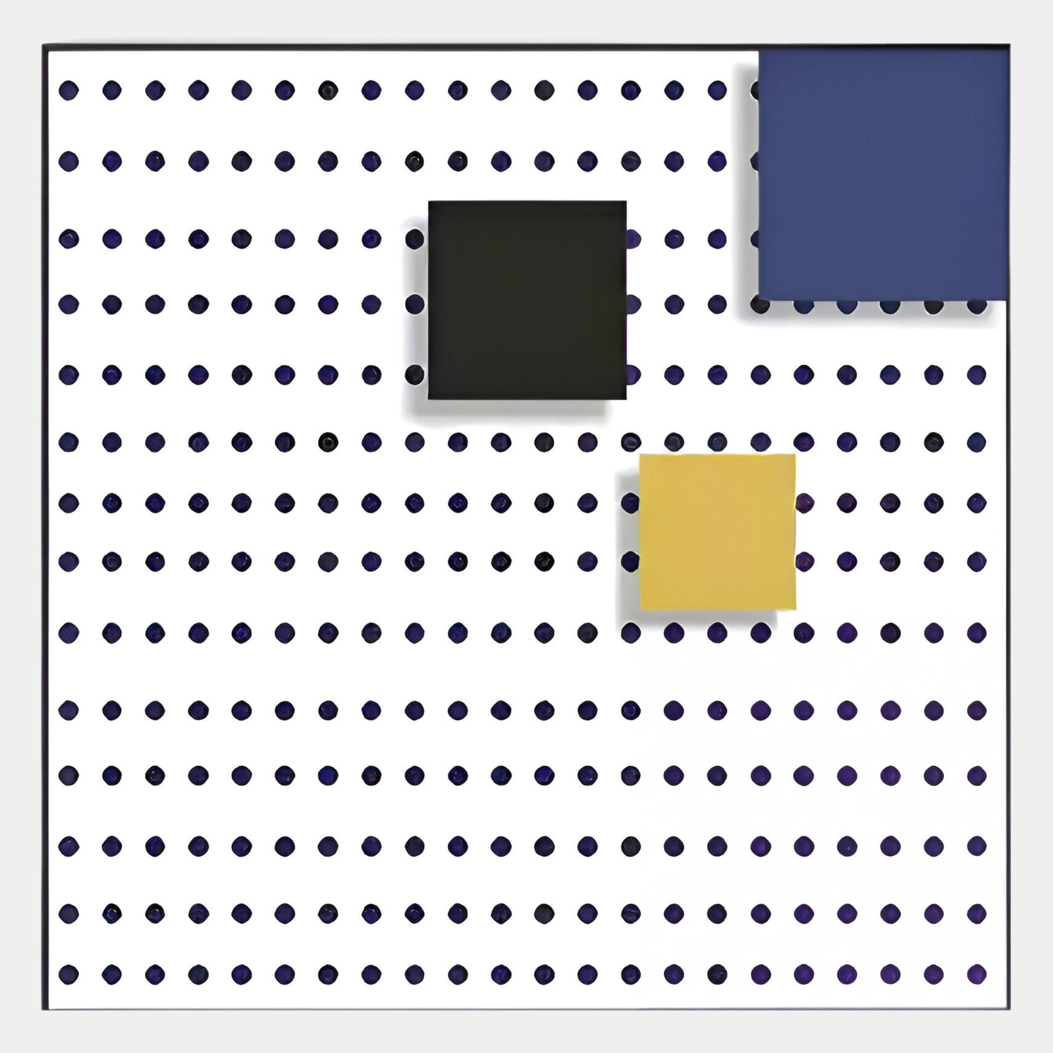 The Orison Geometric Play Crystal Porcelain 3D Wall Art by Giant Sculptures displays a grid of black dots on white, highlighted by a bold blue square at the top right, a small black center square, and a yellow one just below and to its right.