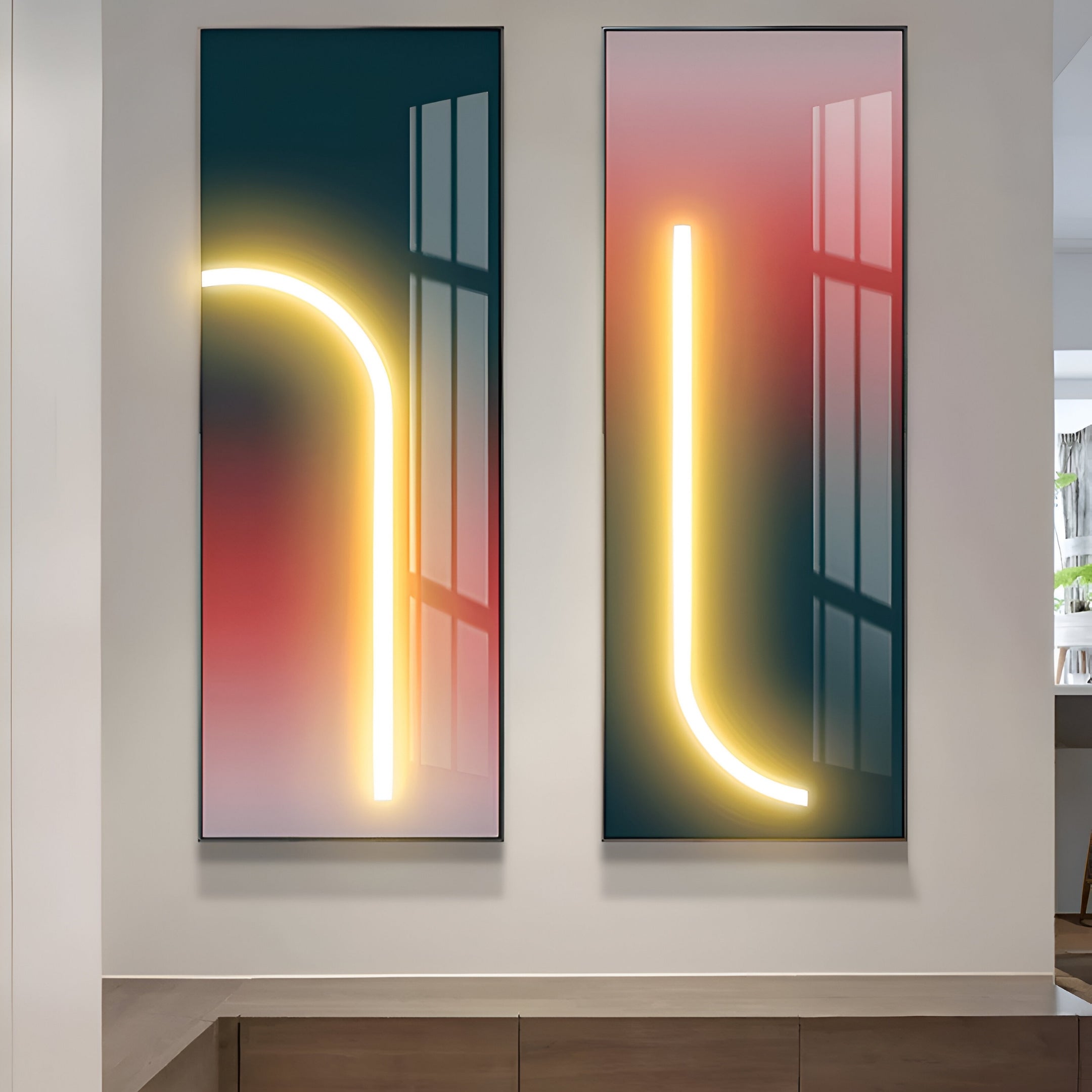 Contemporary LED artwork set featuring curved light accents on a rich gradient background, enhancing upscale interior aesthetics.