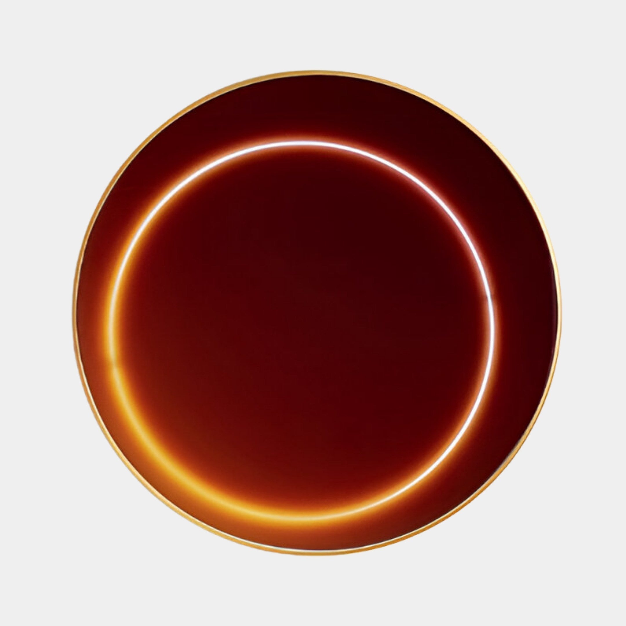 The Aurora Ember Glow Crystal Porcelain LED Wall Art by Giant Sculptures features a circular design with a rich, dark red center encircled by a glowing golden ring. Its warm, gradient light offers a soft contrast against the deep red background, creating minimalist and abstract elegance.