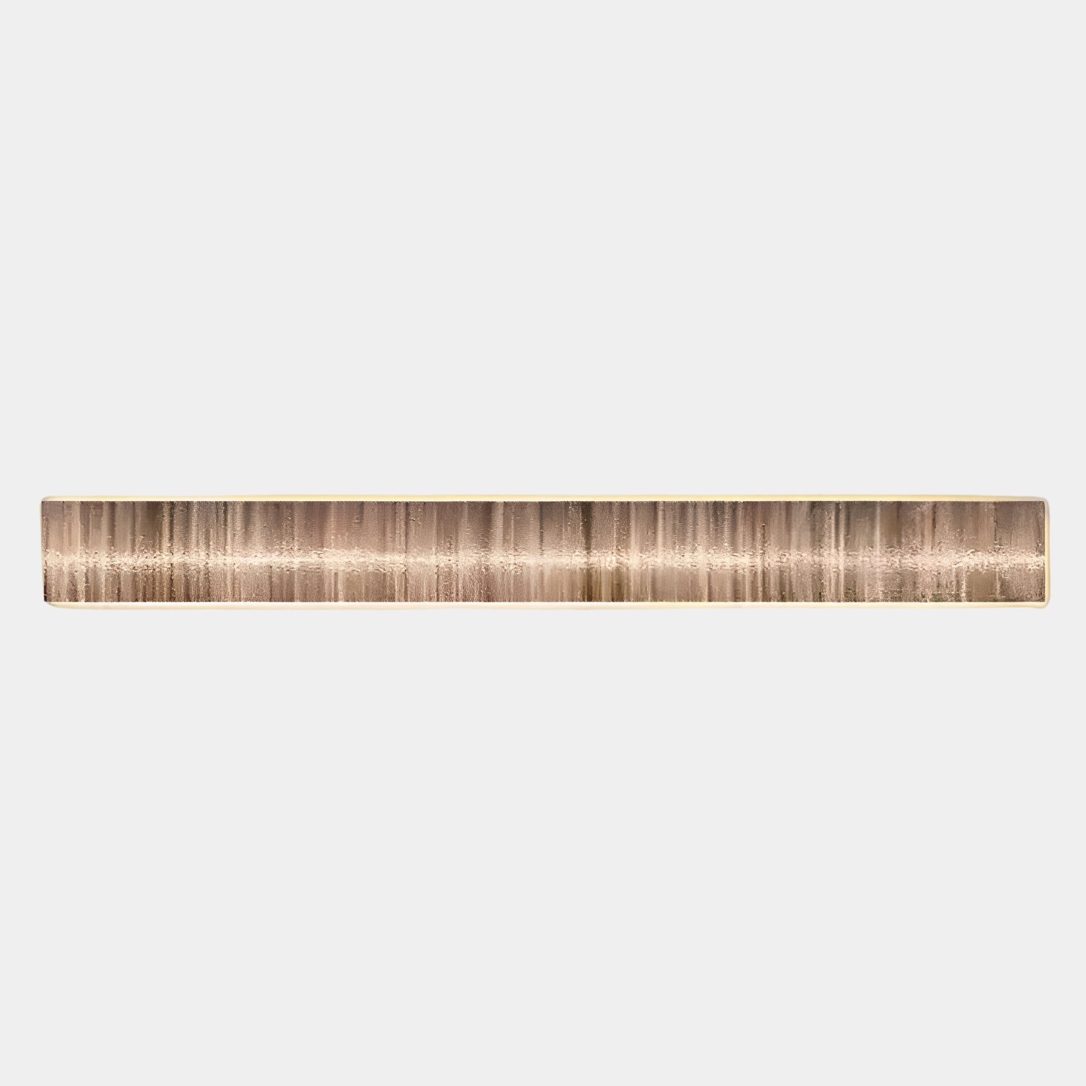 A horizontal rectangular metallic object with a brushed gold finish and subtle vertical lines, inspired by Giant Sculptures Radiance Sandy Gold Canvas LED Wall Art, displayed against a plain white background.