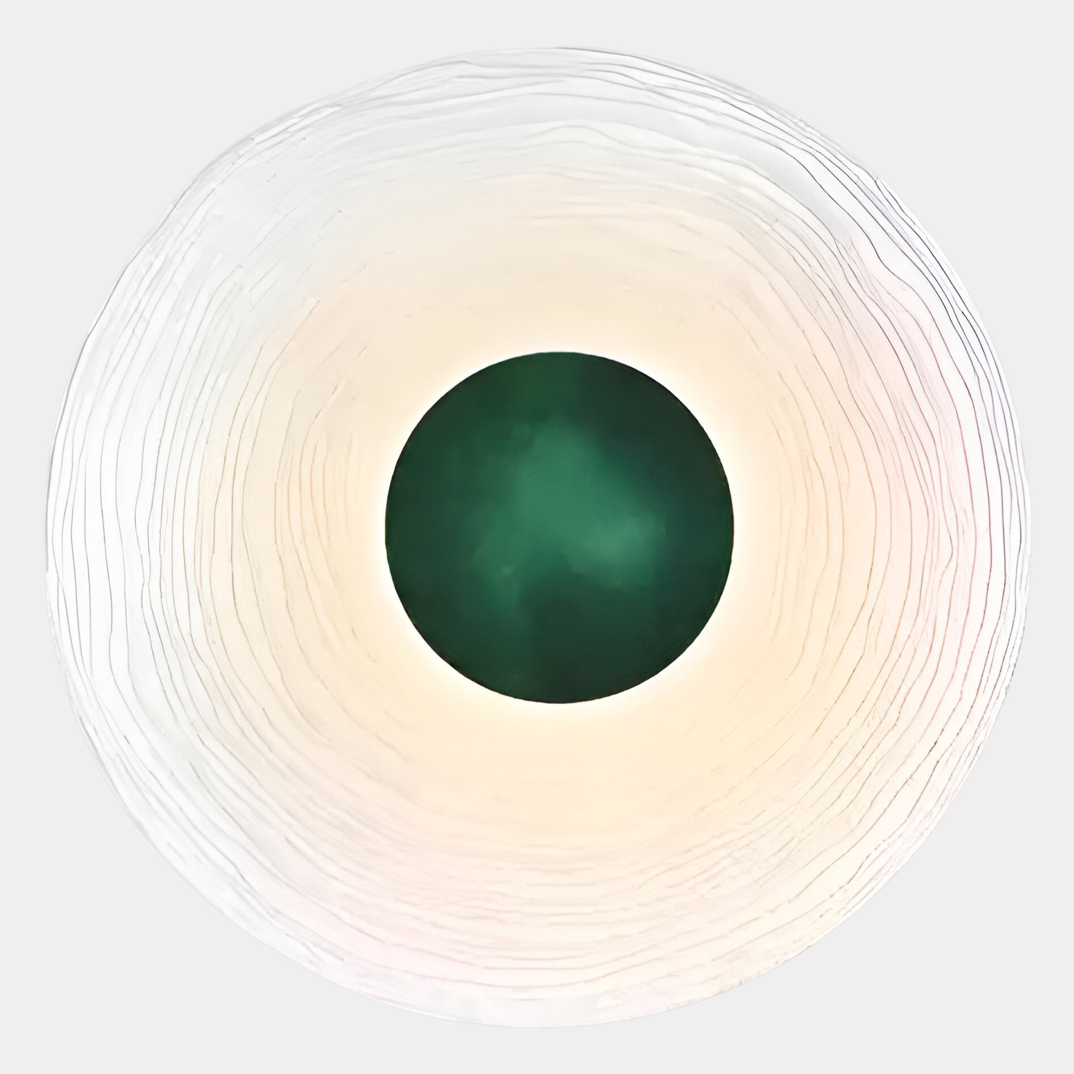 The Ventus Emerald Surge Wood Carving 3D LED Wall Art by Giant Sculptures features a circular abstract design with an emerald center, concentric textured white rings, and subtle shadows on a light gray background.