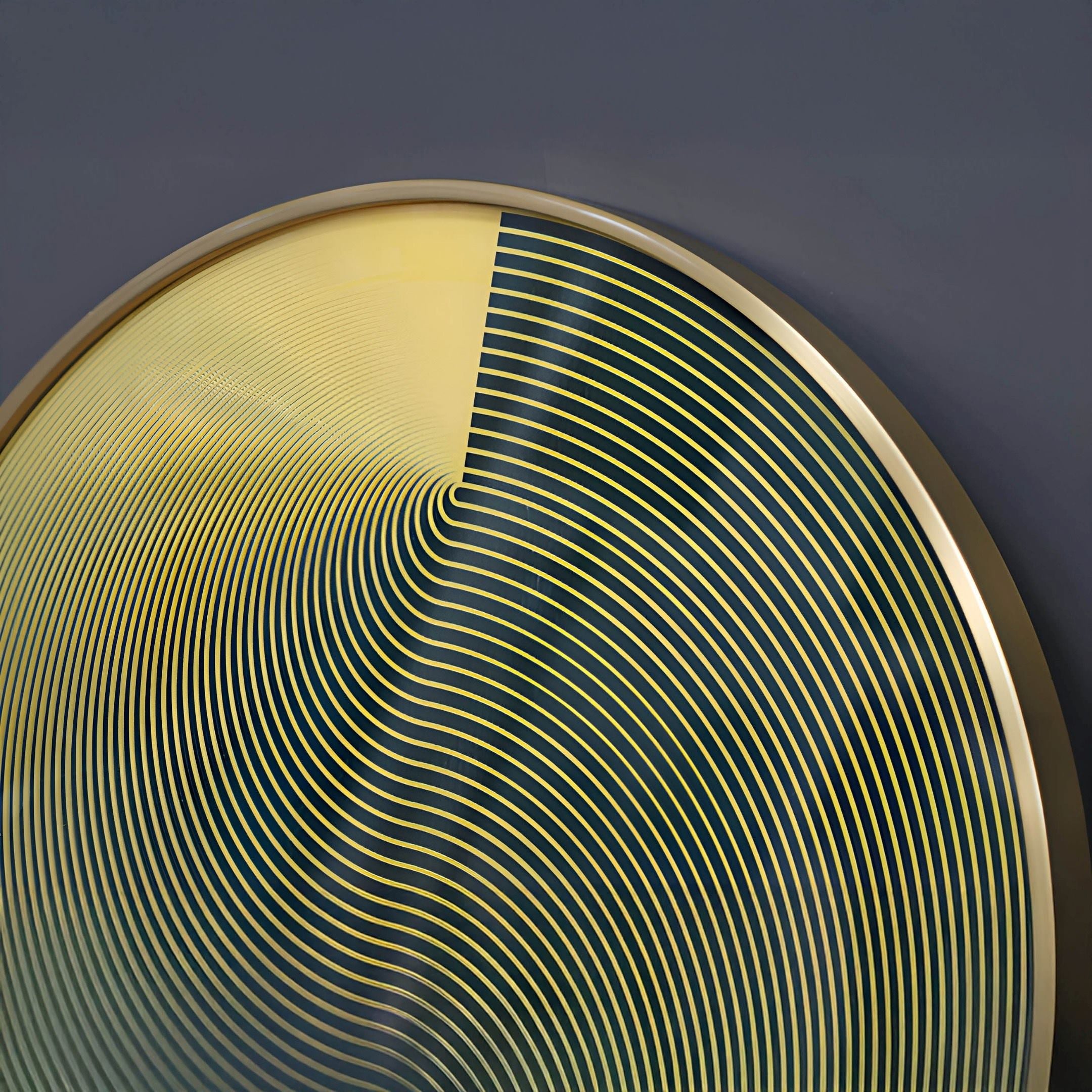 Giant Sculptures Astral Gold Crystal Porcelain LED Wall Art features a captivating swirl of yellow and black concentric lines in an aluminum frame, creating modern allure against a dark backdrop.