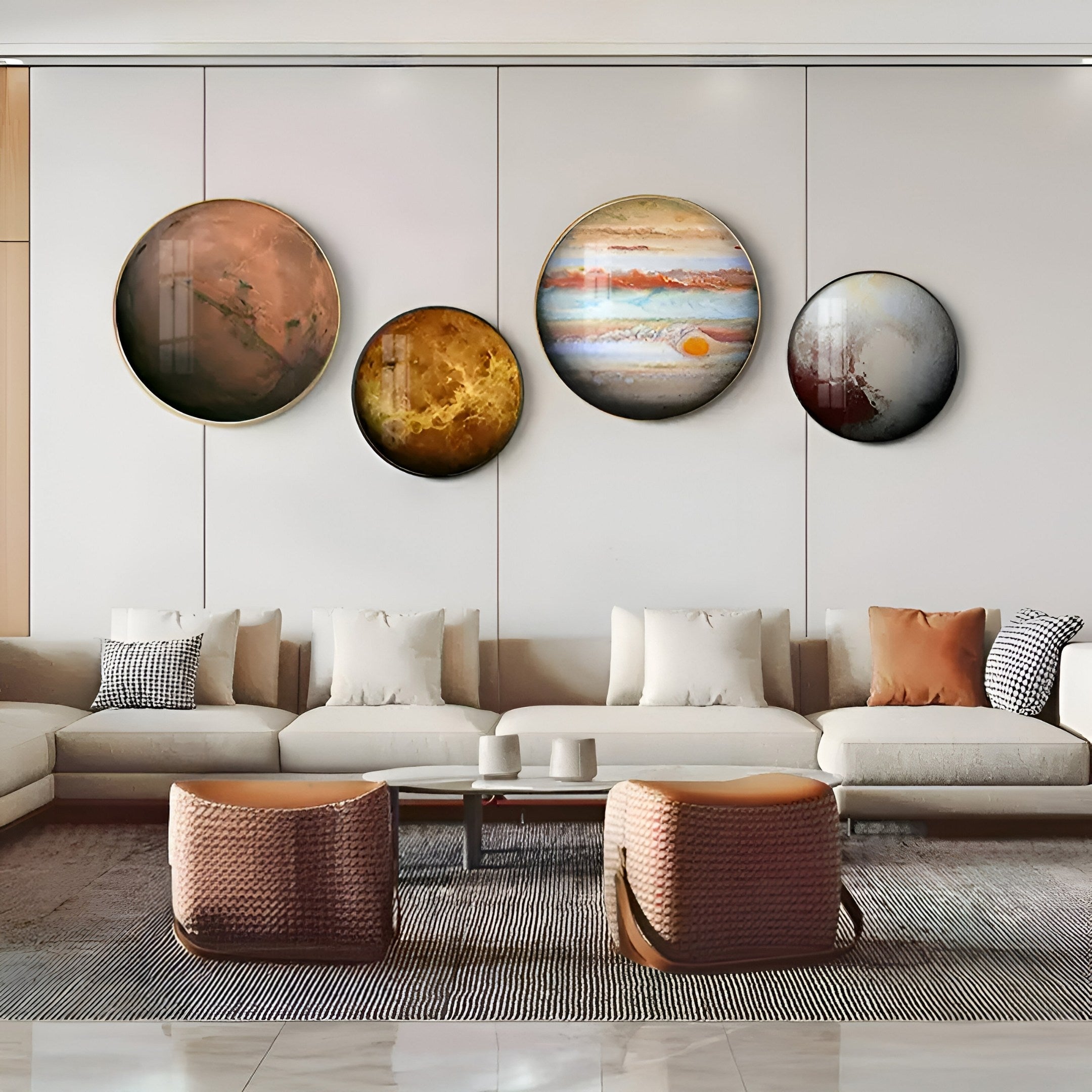 A modern living room showcases a striking design with a light-toned sectional sofa and two woven ottomans. Above the sofa hang four space-themed circular artworks, including the Galaxia Venus Crystal Porcelain LED Wall Art by Giant Sculptures, capturing planetary aesthetics and modern style.