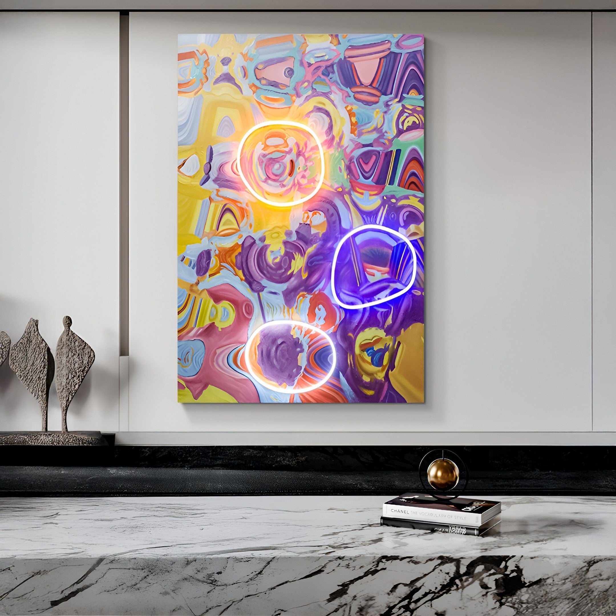 The Elysian Chromatic Vortex Oil Painting 3D LED Wall Art by Giant Sculptures showcases swirling colors of yellow, purple, and blue with neon accents in orange, pink, blue, and white. It elegantly hangs above a dark marble surface with decorative items.