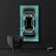 A modern room showcases a black textured chair beside the Horizon Endless Horizon 3D LED Mirror Wall Art by Giant Sculptures, adorned with glowing turquoise lines. The sleek contemporary ambiance is complemented by a small round black-and-white container elegantly placed on the floor.