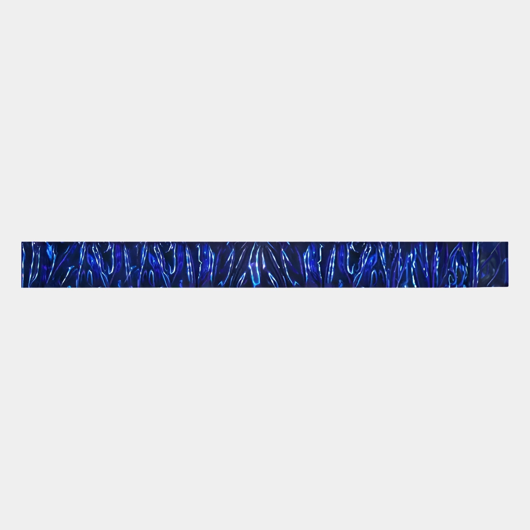 The Textura 3D Sapphire Blue Leather Design Wall Art by Giant Sculptures features a horizontal, narrow strip with a blue and black glowing abstract pattern—ideal for luxury interior design.