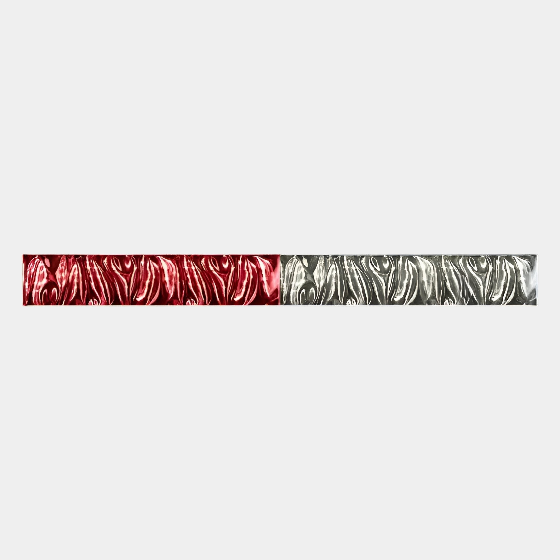Textura 3D Red And Silver Leather Design Wall Art by Giant Sculptures features a horizontal bar split in half, red on the left and silver on the right, both with swirling abstract patterns on light gray for a modern, eye-catching look.
