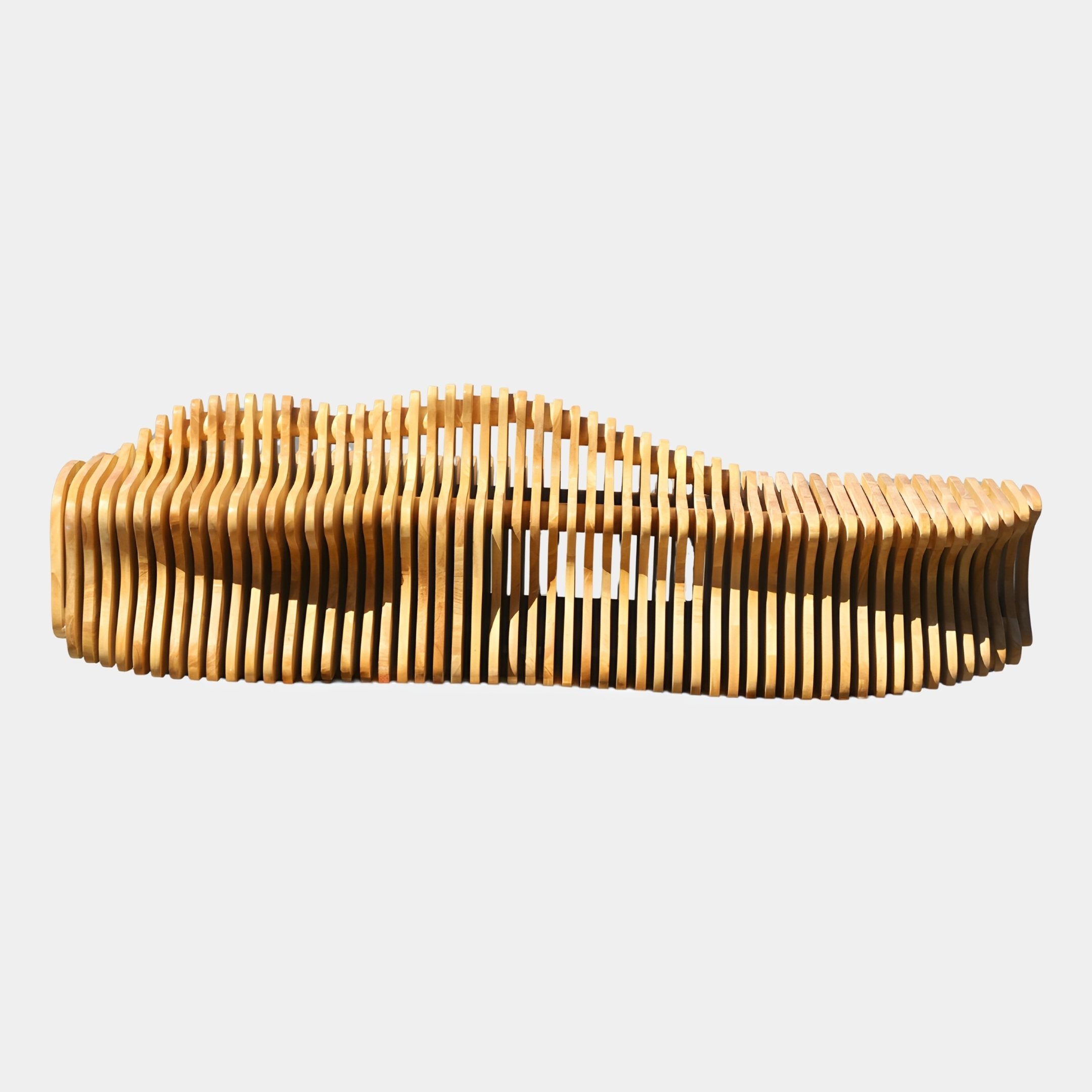Giant Sculptures Wave Bench Natural Abstract Wood Sculpture 220cm, honey-toned vertical slats forming an undulating wave silhouette, shown on a plain background.