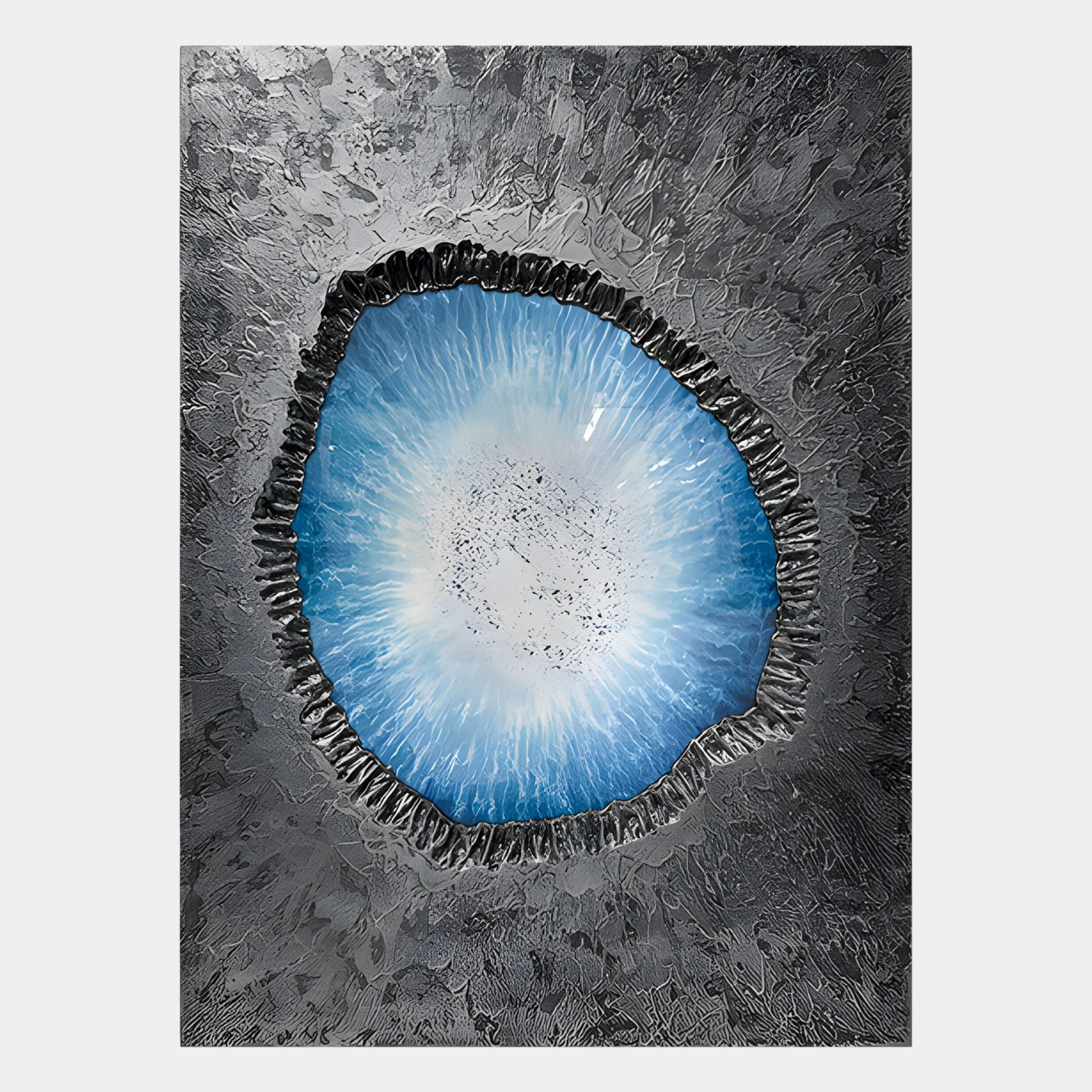 The Vorthera Sky Radiance Textured Silver 3D Wall Art by Giant Sculptures features a central blue and white circular design with jagged black borders and textured gray and black accents, ideal for contemporary wall decor or as a striking sculptural accent.