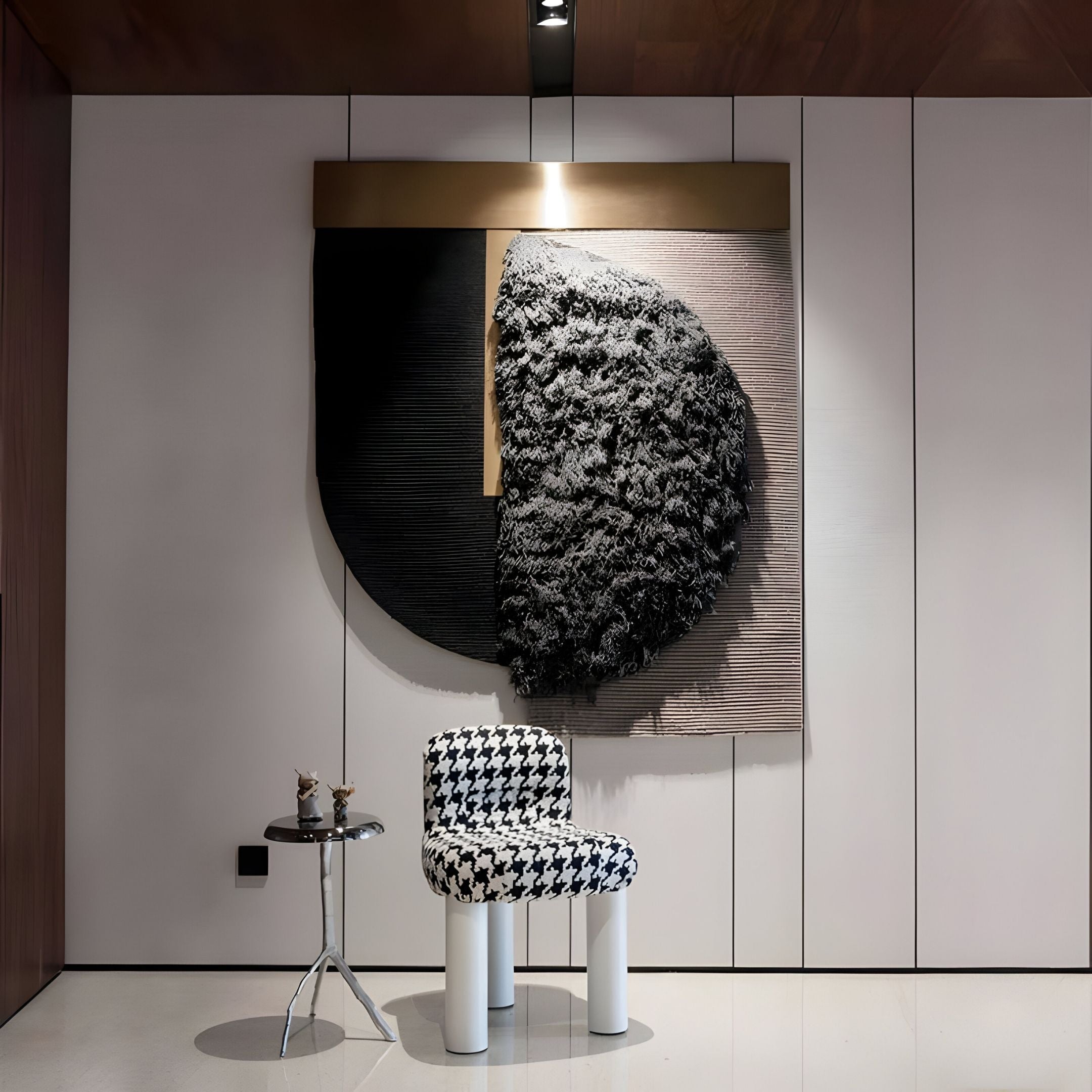 A modern room featuring Halvoria Black & Charcoal Fibre Shield 3D Wall Art by Giant Sculptures, a sculptural piece on a round side table, and a houndstooth chair with cylindrical legs on a glossy floor.