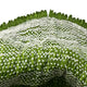 Close-up of the Lyronda Green Textured Woven 3D Wall Art by Giant Sculptures, featuring interlaced green and white strands in a sculptural pattern with slightly frayed edges set against a white background.