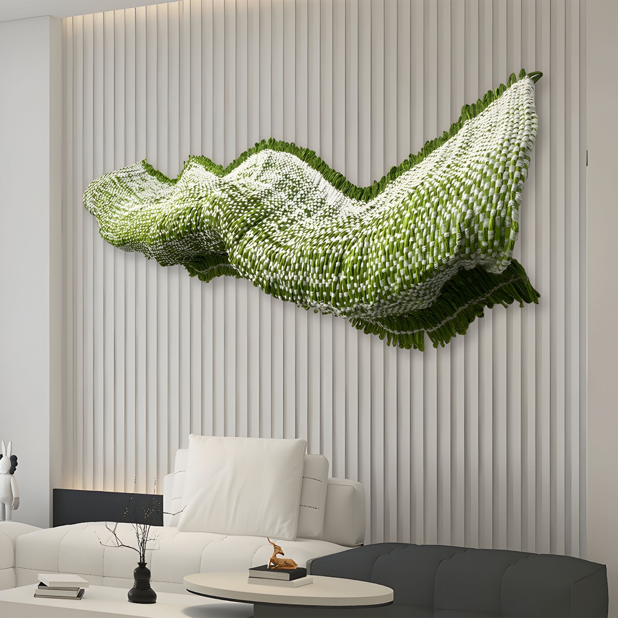 A modern living room with a white sofa features the Lyronda Green Textured Woven 3D Wall Art by Giant Sculptures, a luxury piece with wavy green and white design, mounted on a vertical slat wall above the seating area.