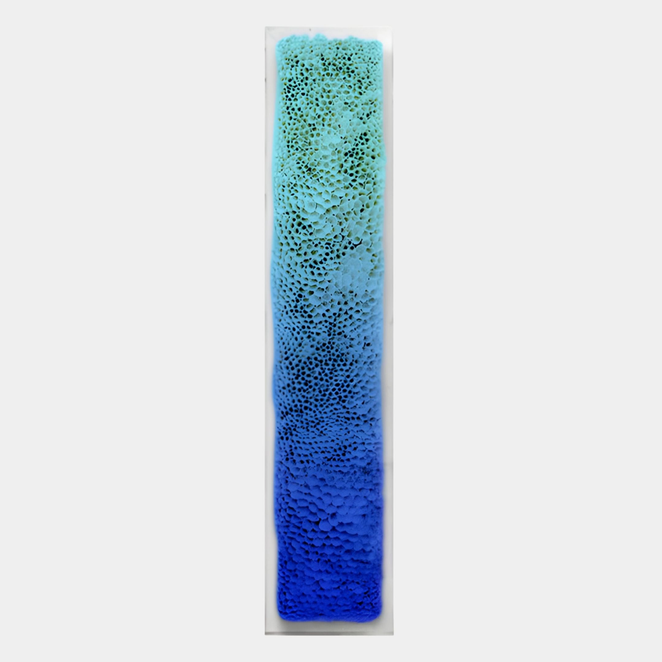 The Aeraline Aqua Blue Vertical Gradient Leather 3D Wall Art by Giant Sculptures is a tall, rectangular piece with a textured surface and bubble-like patterns in a light green to deep blue vertical gradient.