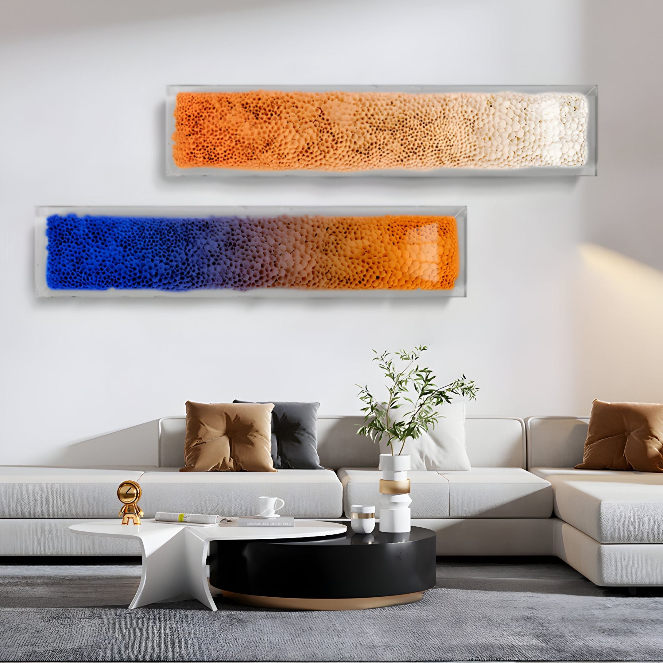 A modern living room with a white sectional sofa, neutral throw pillows, a round coffee table, and Giant Sculptures' Aeraline Sunset Blue Vertical Gradient Leather 3D Wall Art displayed above the sofa.