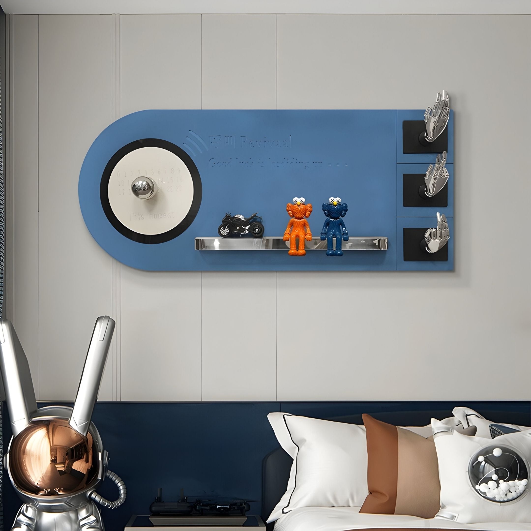 The Nexivra Blue Techscape Interactive 3D Wall Art by Giant Sculptures, shaped like a record player, showcases two colorful figurines, a mini motorcycle, and metallic hand sculptures above a sofa with a copper-helmeted rabbit statue nearby.