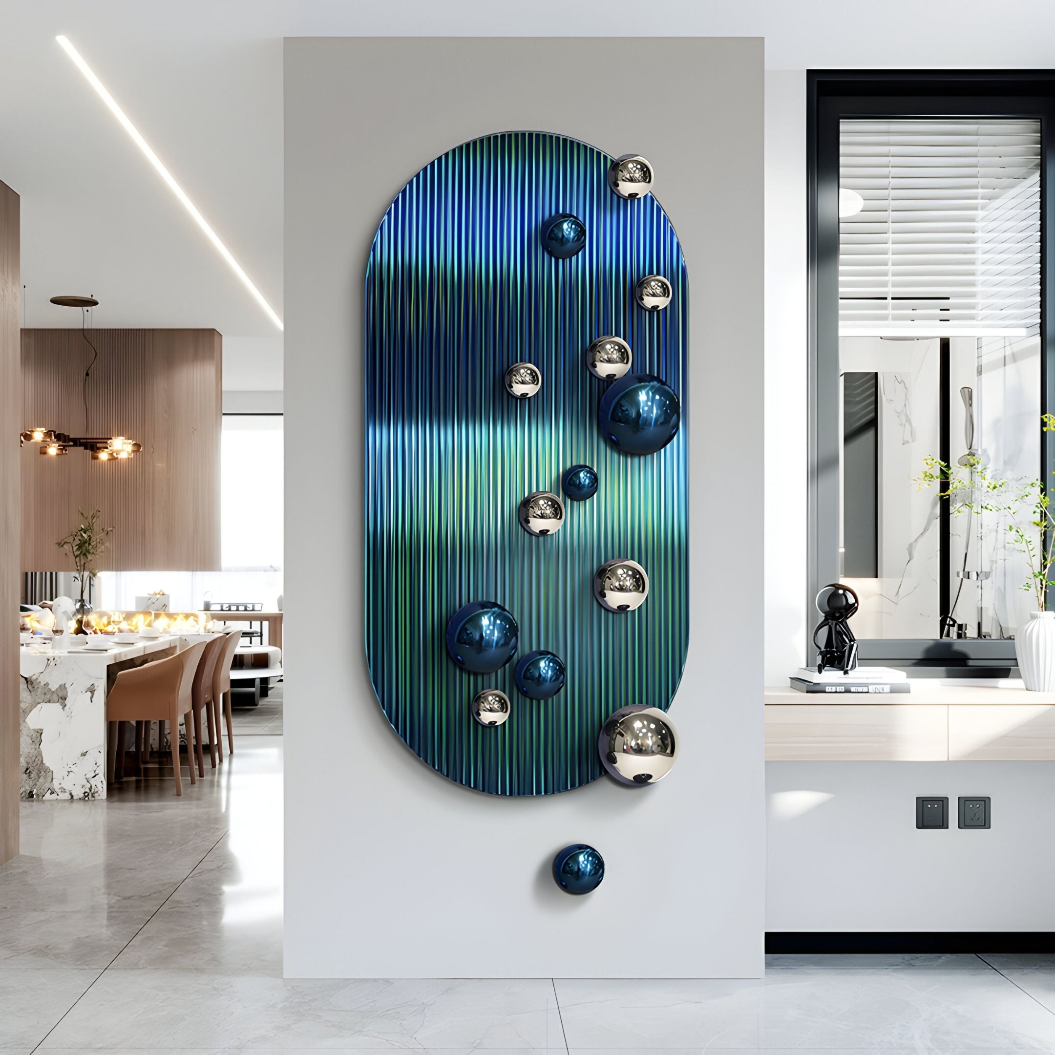 Virellon Blue Gradient 3D Wall Art by Giant Sculptures features an oval panel with blue and green stripes and navy & silver metal balls, creating striking feature wall decor for open-plan living and dining areas.