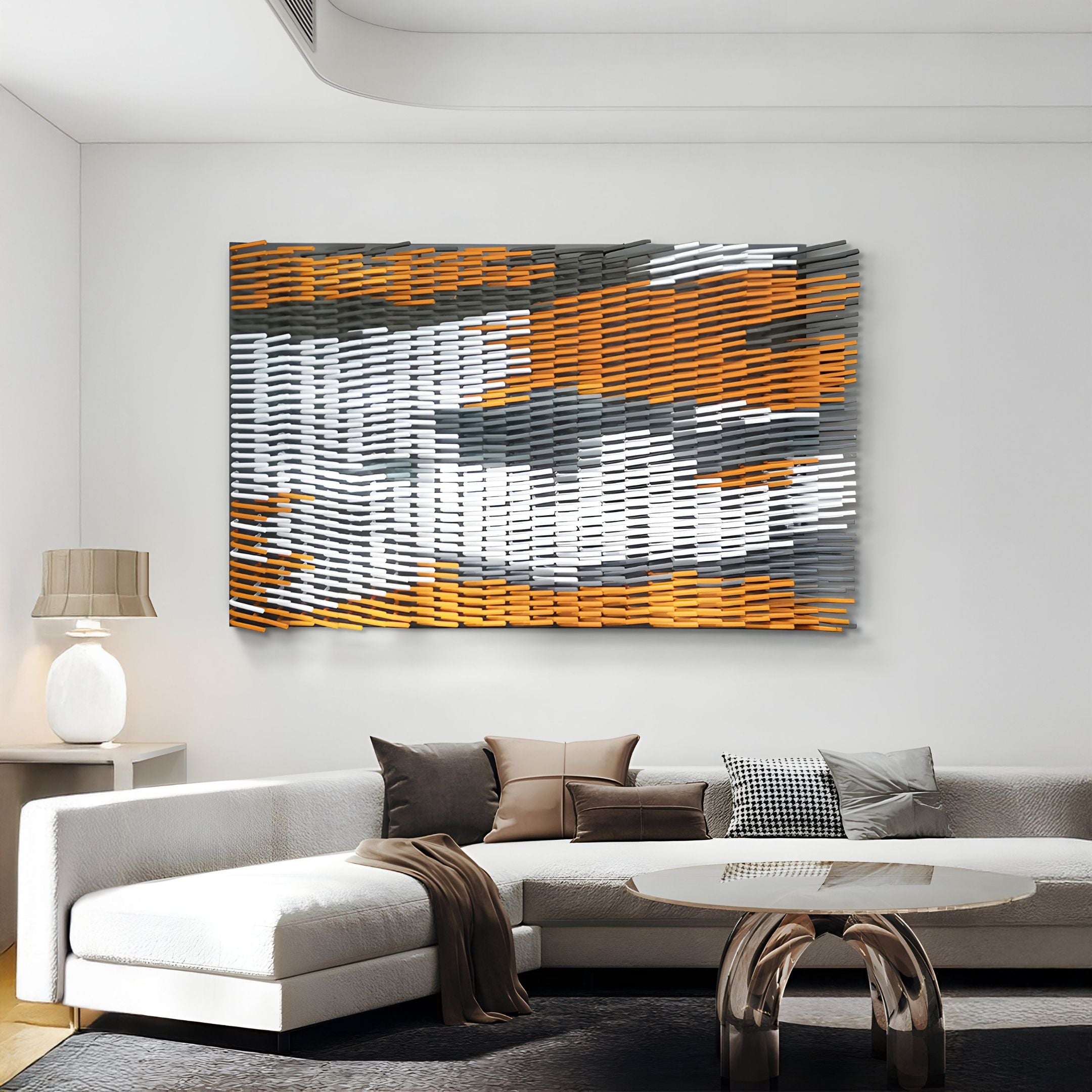 A modern living room with a white sectional sofa, neutral pillows, a glass coffee table, and the Giant Sculptures Waverno Ember & Graphite Flow Metal 3D Wall Art featuring orange, gray, and white above the couch.