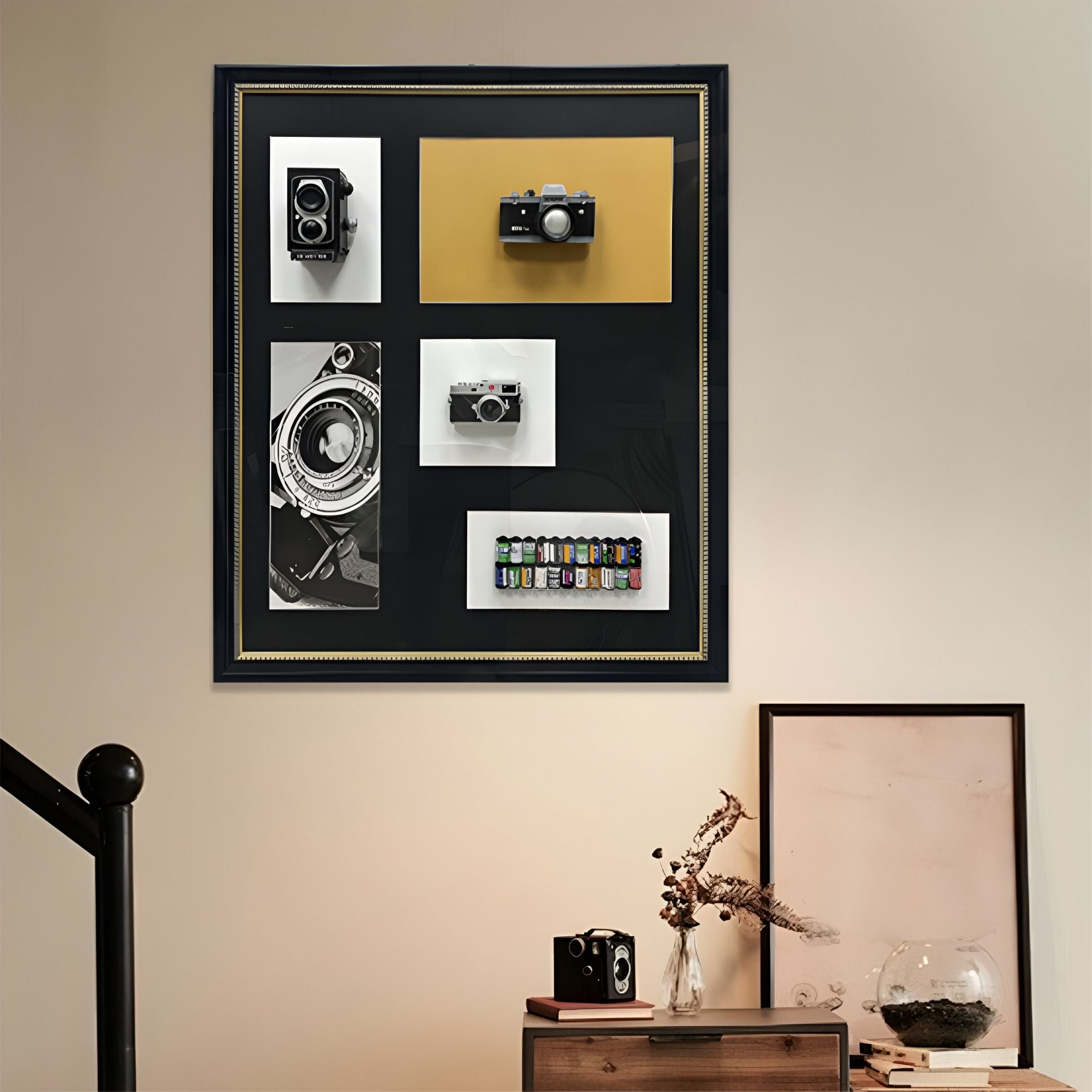 The Fotera Vintage Camera Black Framed 3D Wall Art by Giant Sculptures features vintage cameras and film rolls on mixed backgrounds above a wooden dresser—ideal decor for any analogue photography enthusiast.