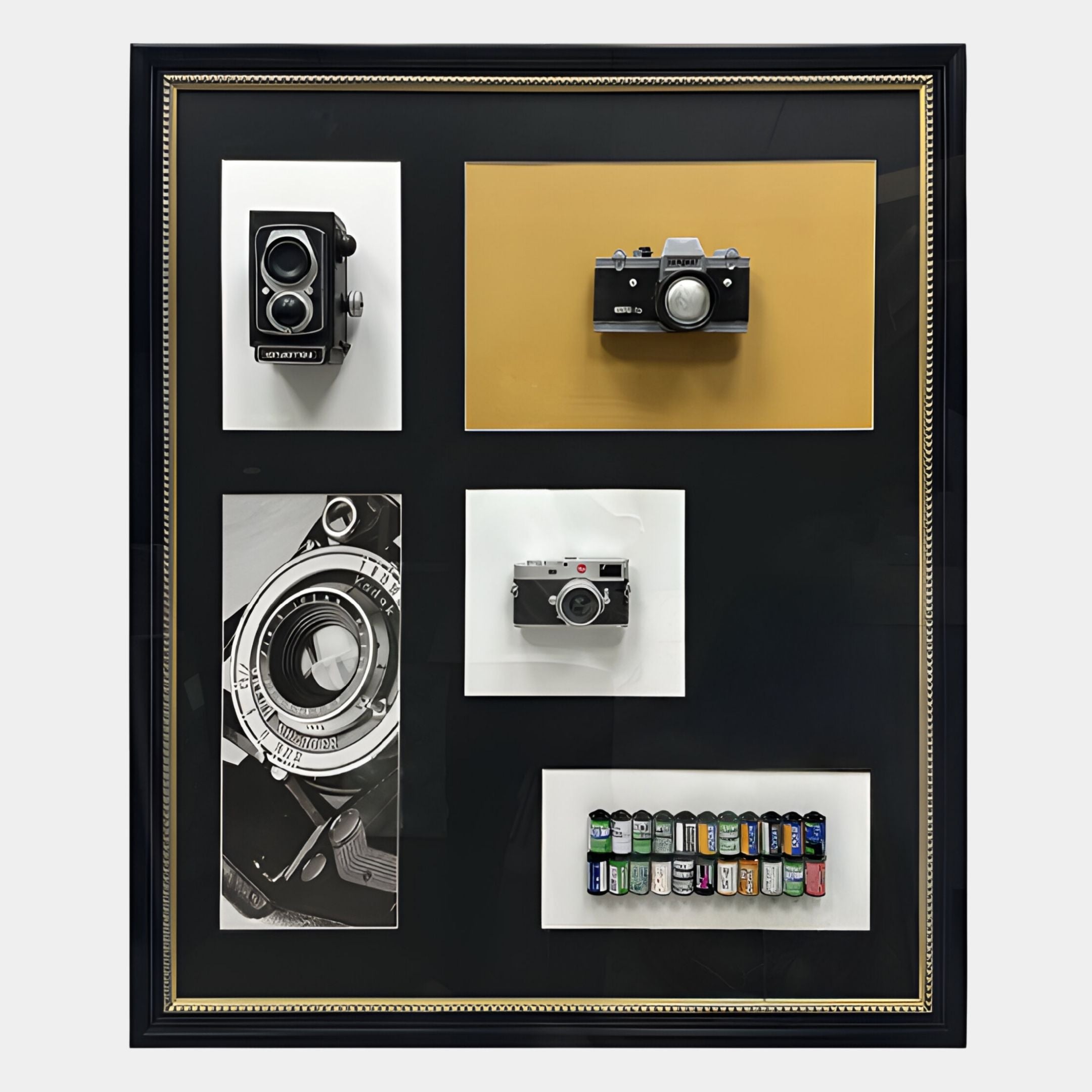 The Fotera Vintage Camera Black Framed 3D Wall Art by Giant Sculptures displays vintage cameras, a camera lens close-up, and colorful film canisters—ideal for analogue photography lovers seeking stylish wall decor.
