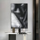 A modern console table with marble top displays minimalist decor beneath the Rivara Obsidian Flow Hand-Painted Rope 3D Wall Art by Giant Sculptures, perfectly complementing sleek modern monochrome interiors.